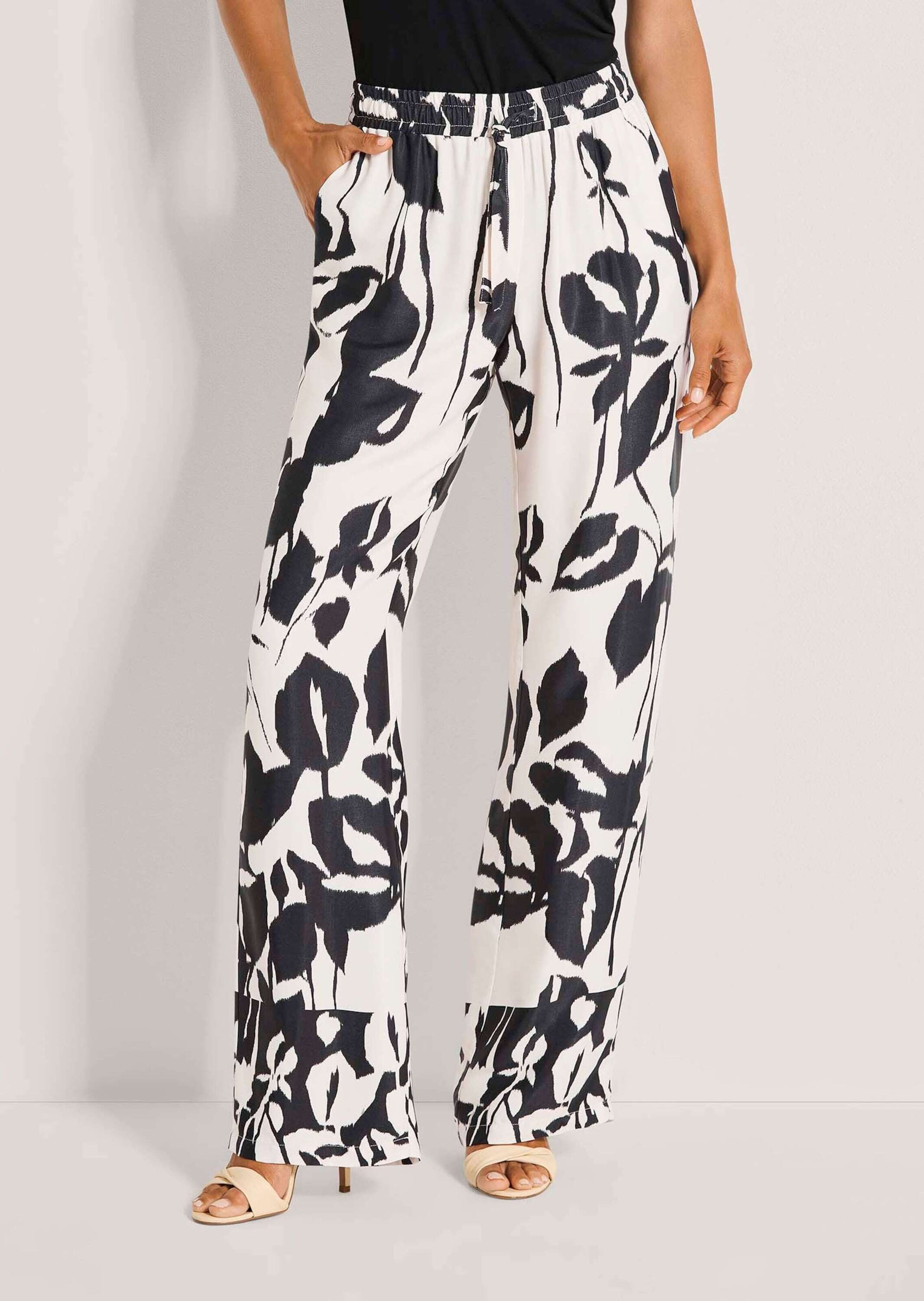 MADELEINE Stoffhose Sommerhose mit floralem Muster Luftige Viskosehose mit Schlupfbund, Nahttaschen und Knöchellänge