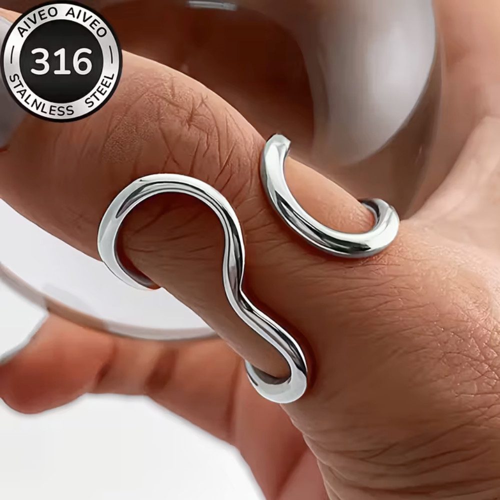 XCOAST Fingerring Wave Ring Damen Silber – Verstellbarer Edelstahl Ring im Wellen-Design (inkl. Schmuckkästchen, 1-tlg., einzeln), verstellbar (anpassbar an verschiedene Fingergrößen)