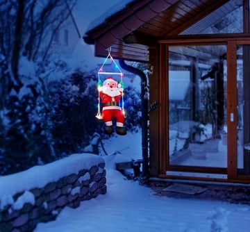 BONETTI Weihnachtsmann Sitzender Weihnachtsmann auf einer Schaukel, mit 20 bunten LED, für Innen- und geschützten Außenbereich, moderne Weihnachtsdeko