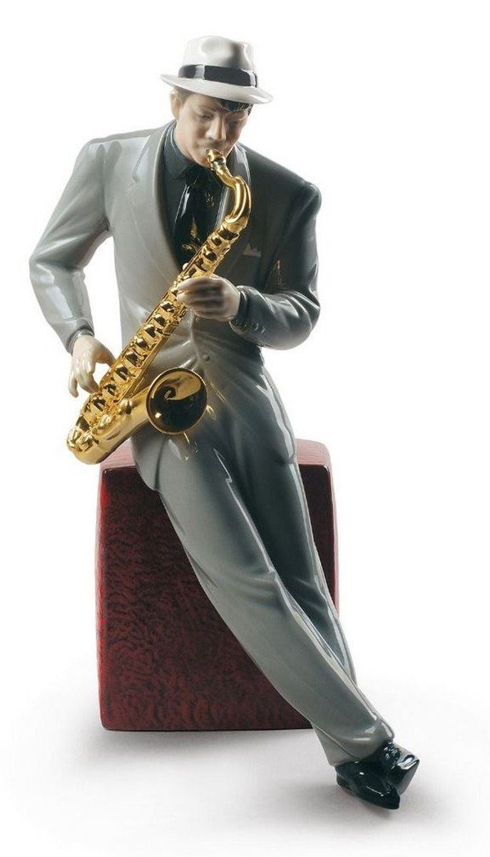 Casa Padrino Dekofigur Casa Padrino Porzellan Skulptur Jazz Saxophonist Mehrfarbig 23 x H. 29 cm - Hangefertigte & Handbemalte Luxus Deko Figur