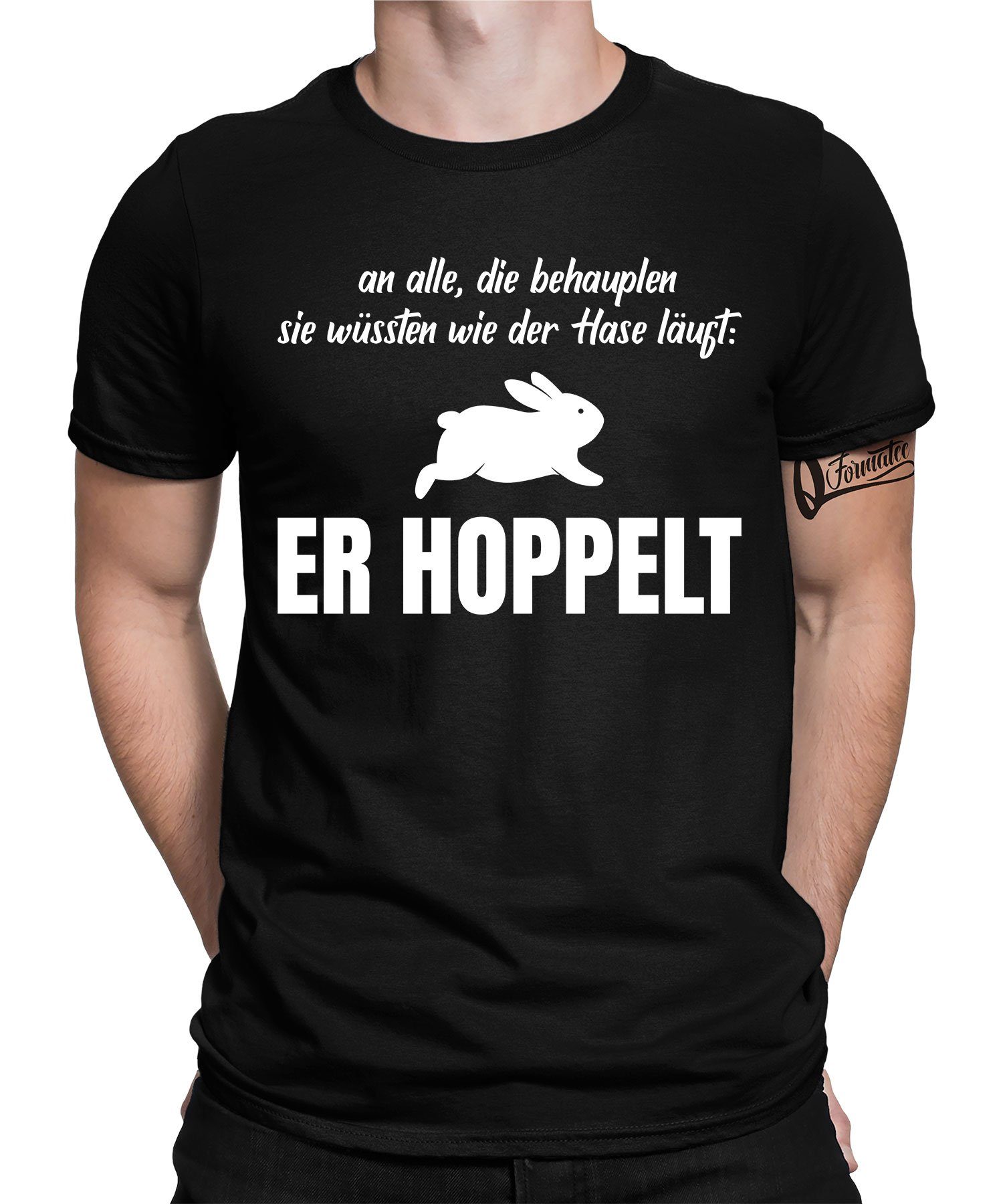 Quattro Formatee Kurzarmshirt Hase Kaninchen Er Hoppelt - Lustiger Spruch Statement Herren T-Shirt (1-tlg) Schwarz