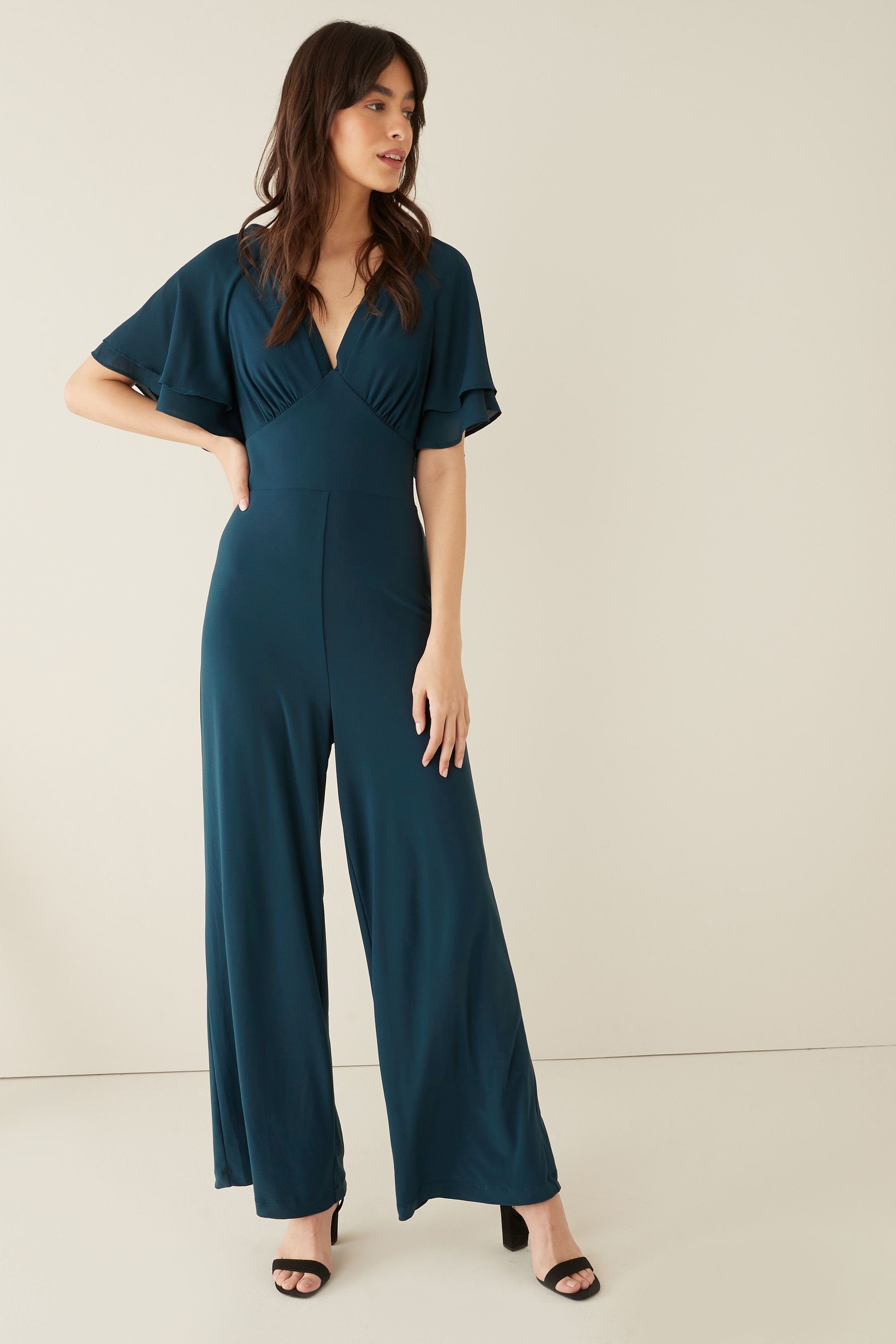 Next Jumpsuit Jumpsuit mit V-Ausschnitt und Trompetenärmeln (1-tlg) günstig online kaufen