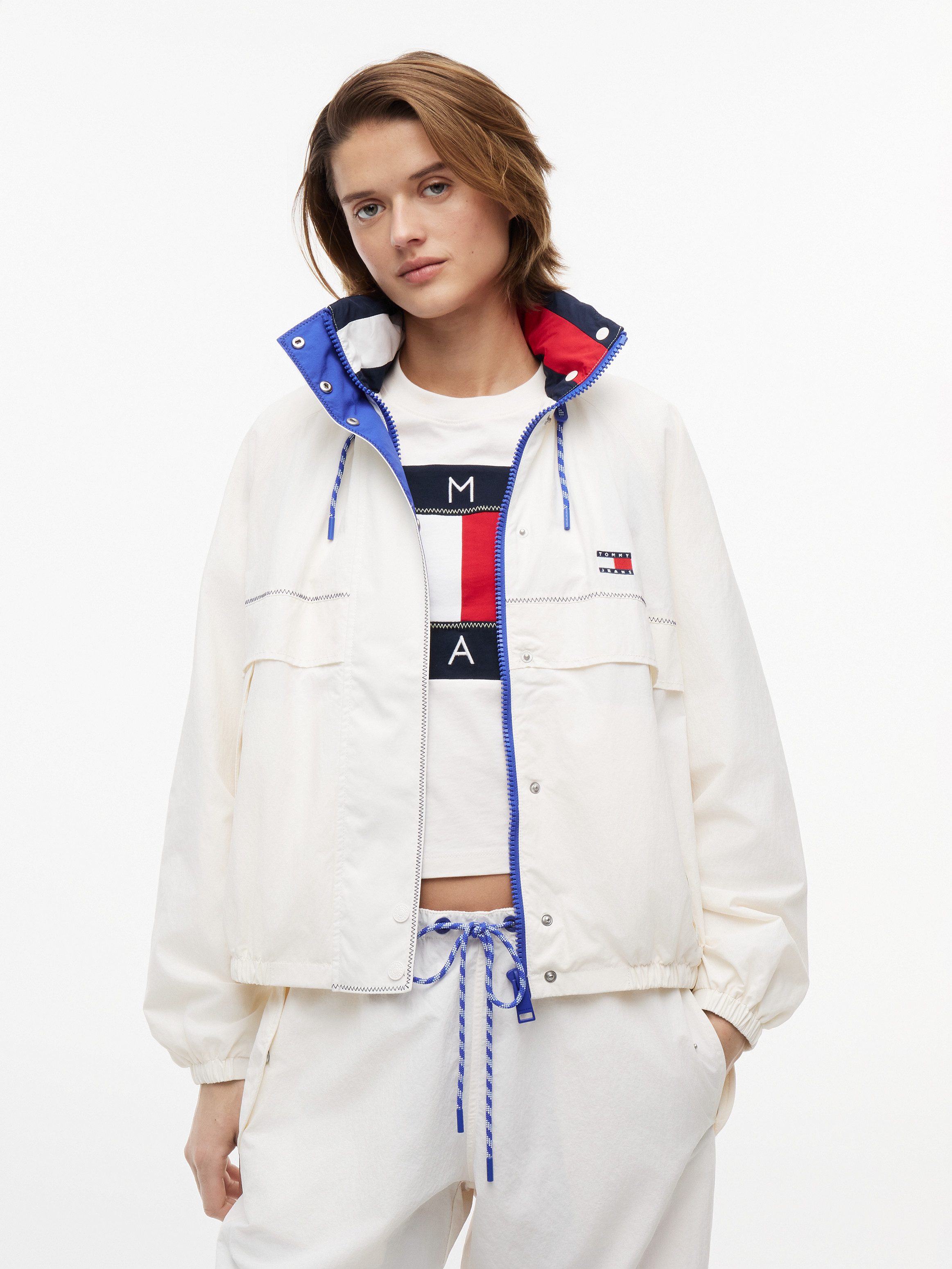 Tommy Jeans Windbreaker TJW COLORBLOCK WINDBREAKER Kunstfaser, elastische Bündchen, verdeckter Reißverschluss