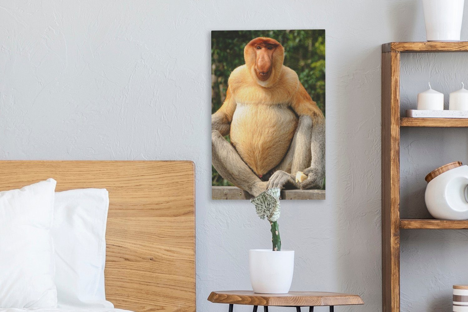 OneMillionCanvasses® Leinwandbild Ein Proboscis-Affe auf Zackenaufhänger, bespannt cm (1 Zaun, inkl. 20x30 St), einem fertig Gemälde, Leinwandbild