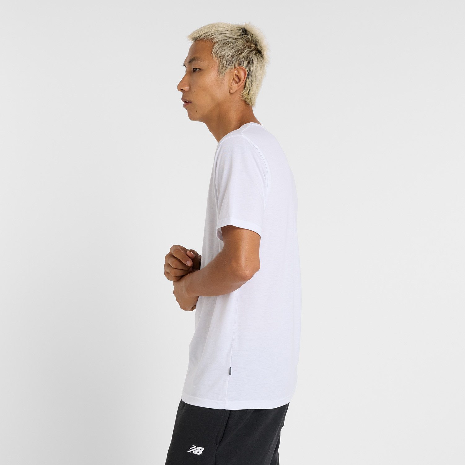 New Balance Laufshirt Heathertech Logo T-Shirt aus Polyester und Baumwolle
