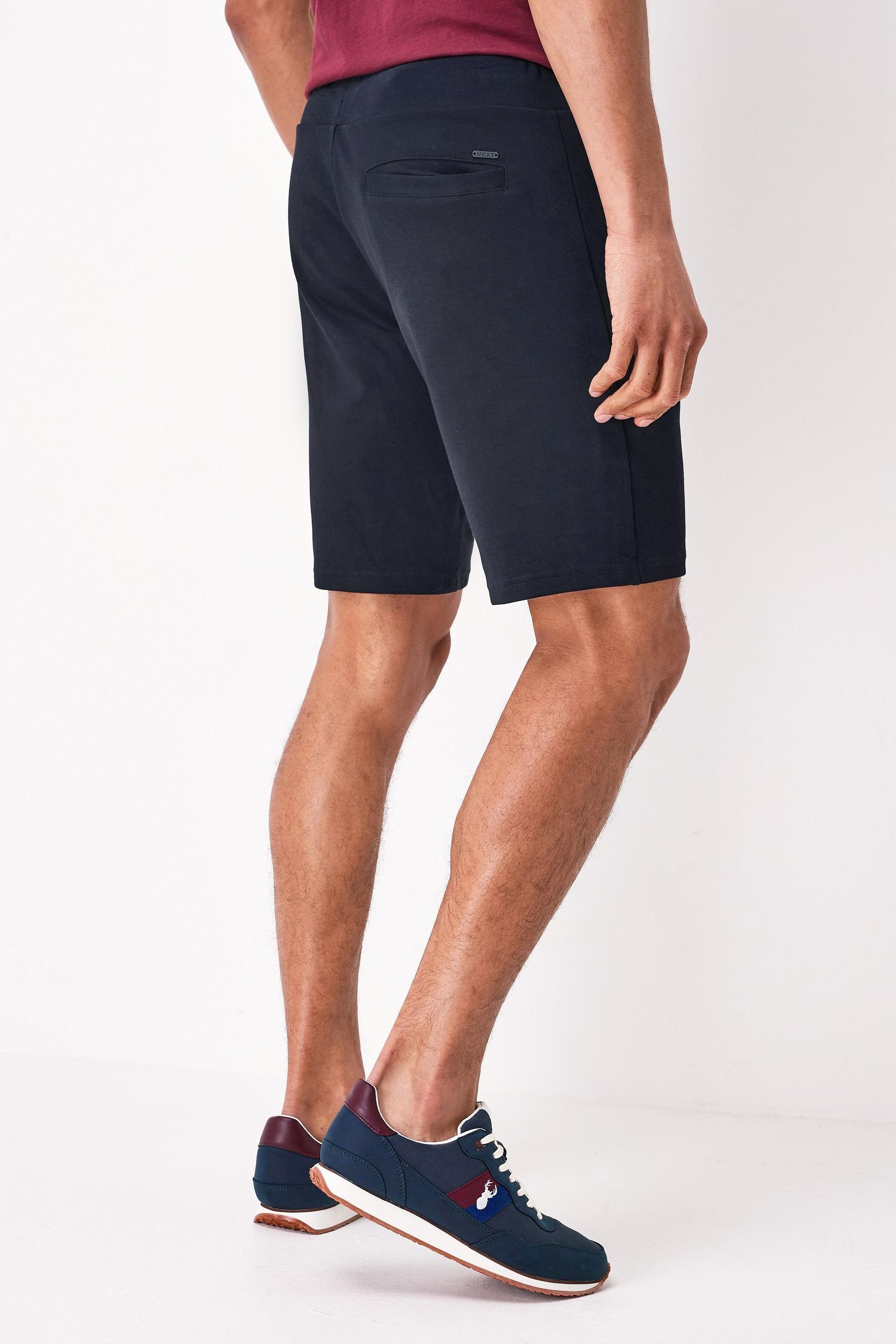 Next Sweatshorts Jersey-Shorts (1-tlg) mit Reißverschlusstaschen-Slim Navy Fit Blue