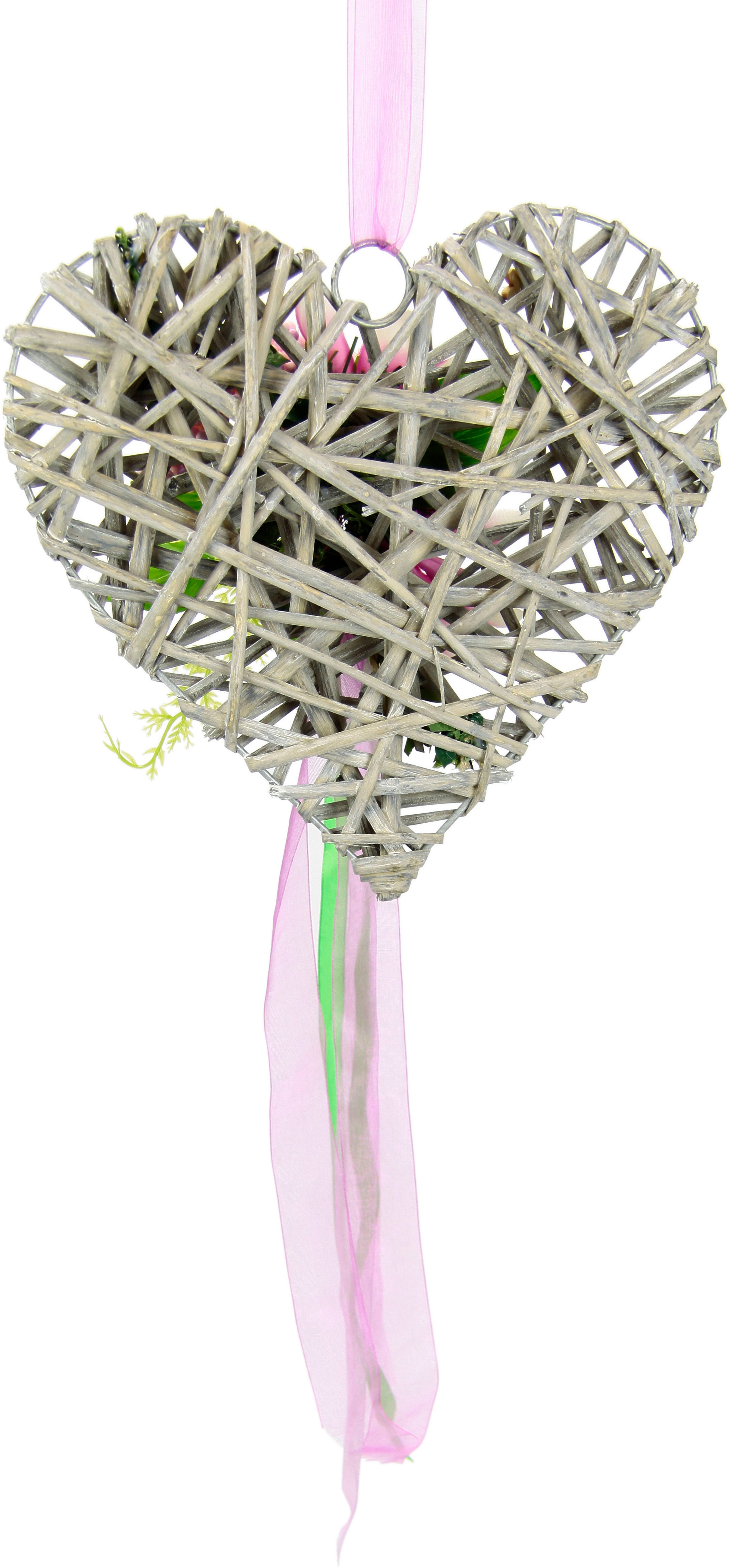 Kunstkranz Herz aus Holz mit künstlichen Magnolien Beeren und Schleife zum günstig online kaufen