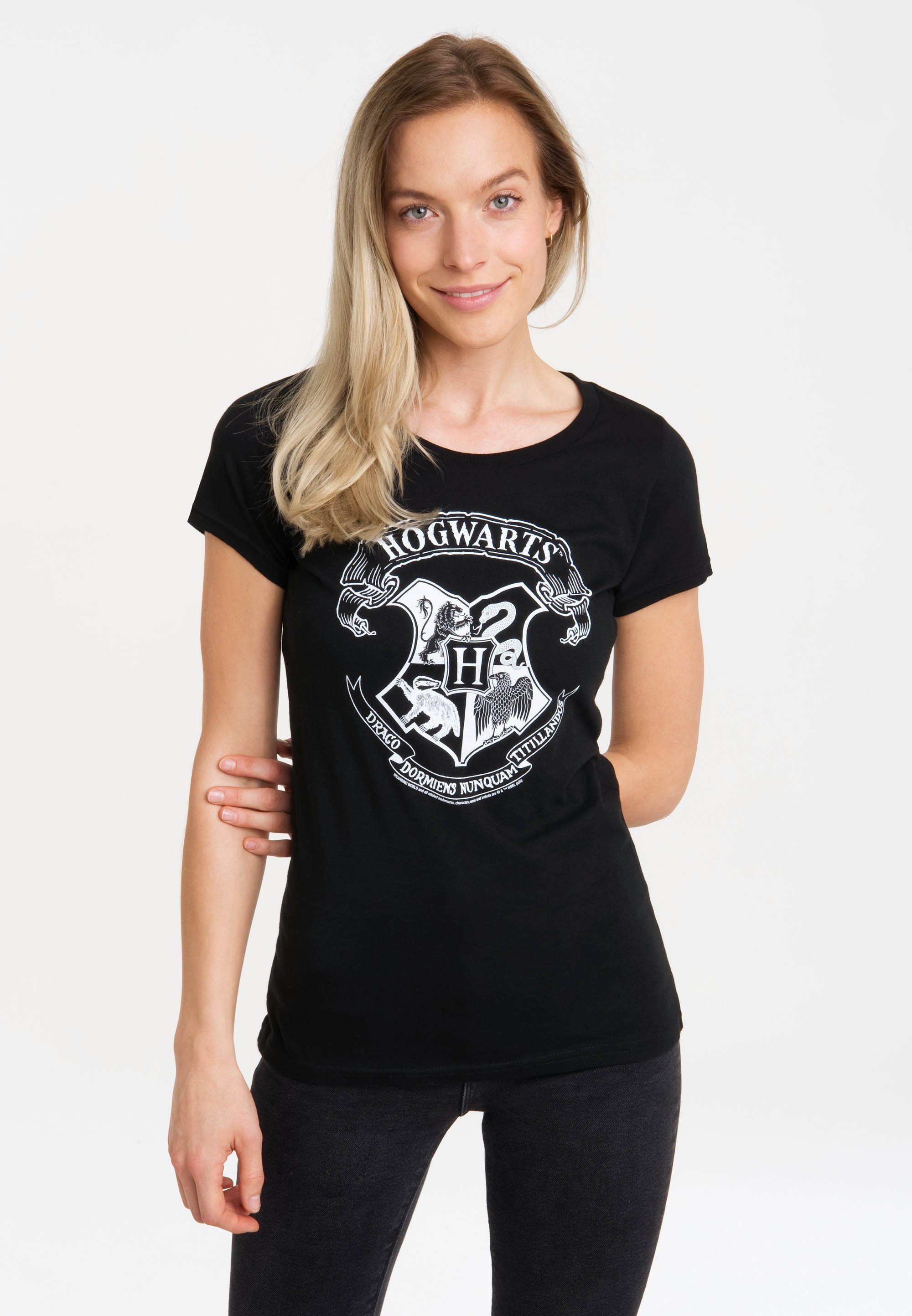 Hingucker (Weiß) lizenziertem ein der mit Hogwarts großem Potter Hogwarts-Print Logo Front - T-Shirt auf Originaldesign, Mit LOGOSHIRT Harry