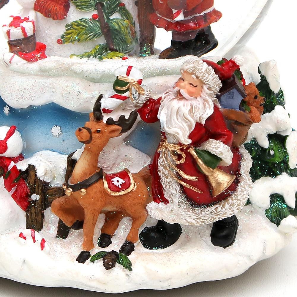 Dekohelden24 Schneekugel Schneekugel Schneemann mit Kind auf aufwendig verziertem Sockel, mit (1 St)