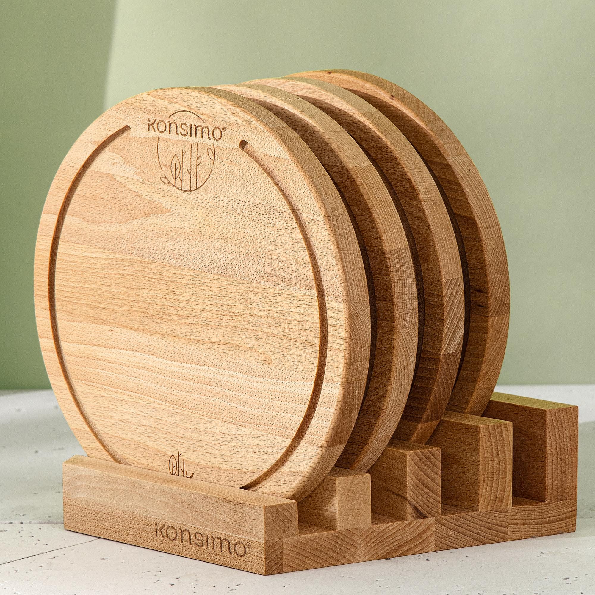 KONSIMO® Schneidebrett LESTE, HEMERO runde Schneidebrett-Set mit Brettständer, Handgefertigt, Massivholz Buche, (Inklusive eines Ständers für 4 Schneidebretter, 5-St), Premium Designschneiderbrett, mit Saftrillen, hergestellt in der EU