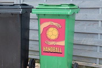 MuchoWow Wandsticker "Handball" auf einem rosa Hintergrund (1 St), Mülleimer-aufkleber, Mülltonne, Sticker, Container, Abfalbehälter