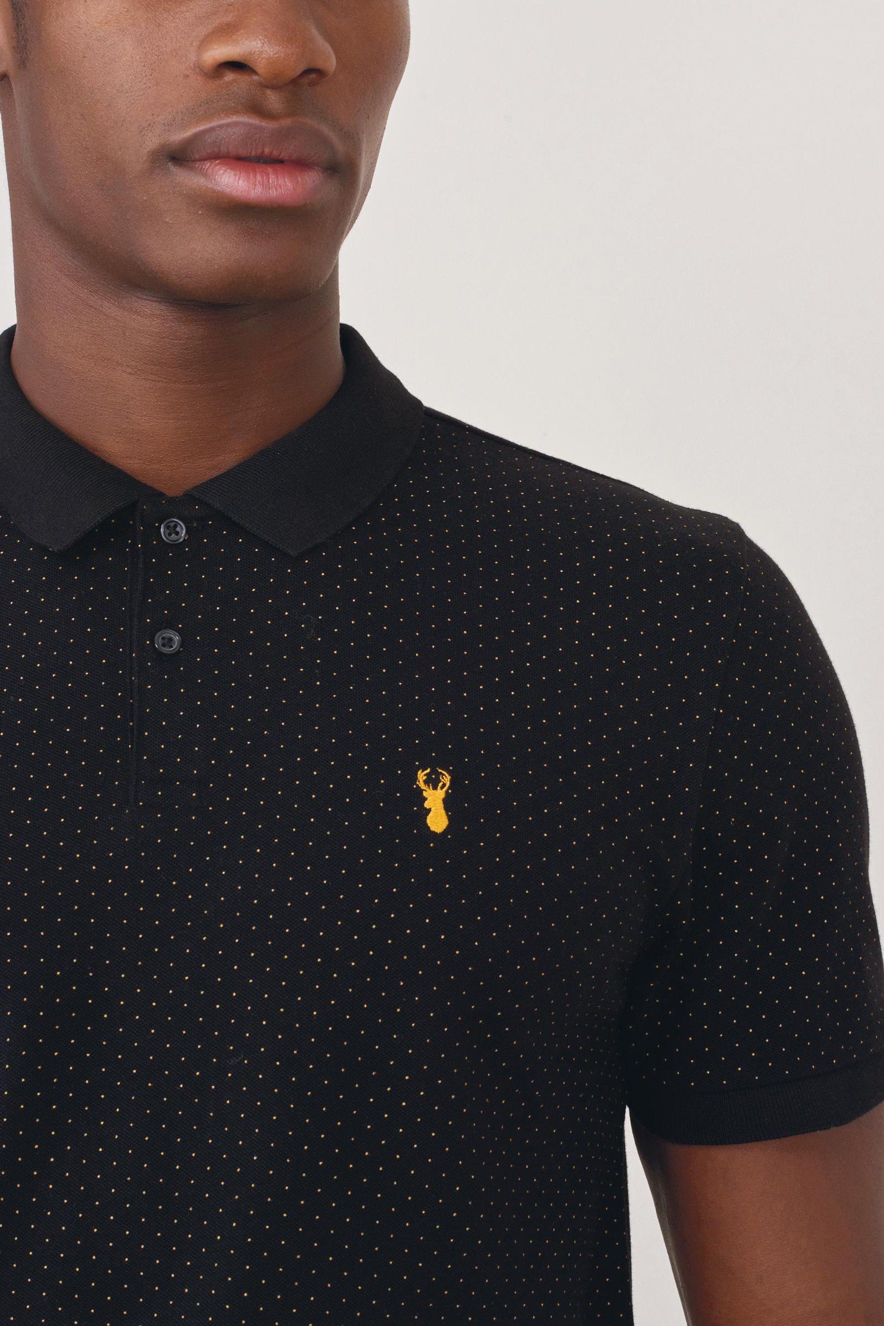 Next Piqué-Poloshirt (1-tlg) Print Black/Gold Poloshirt