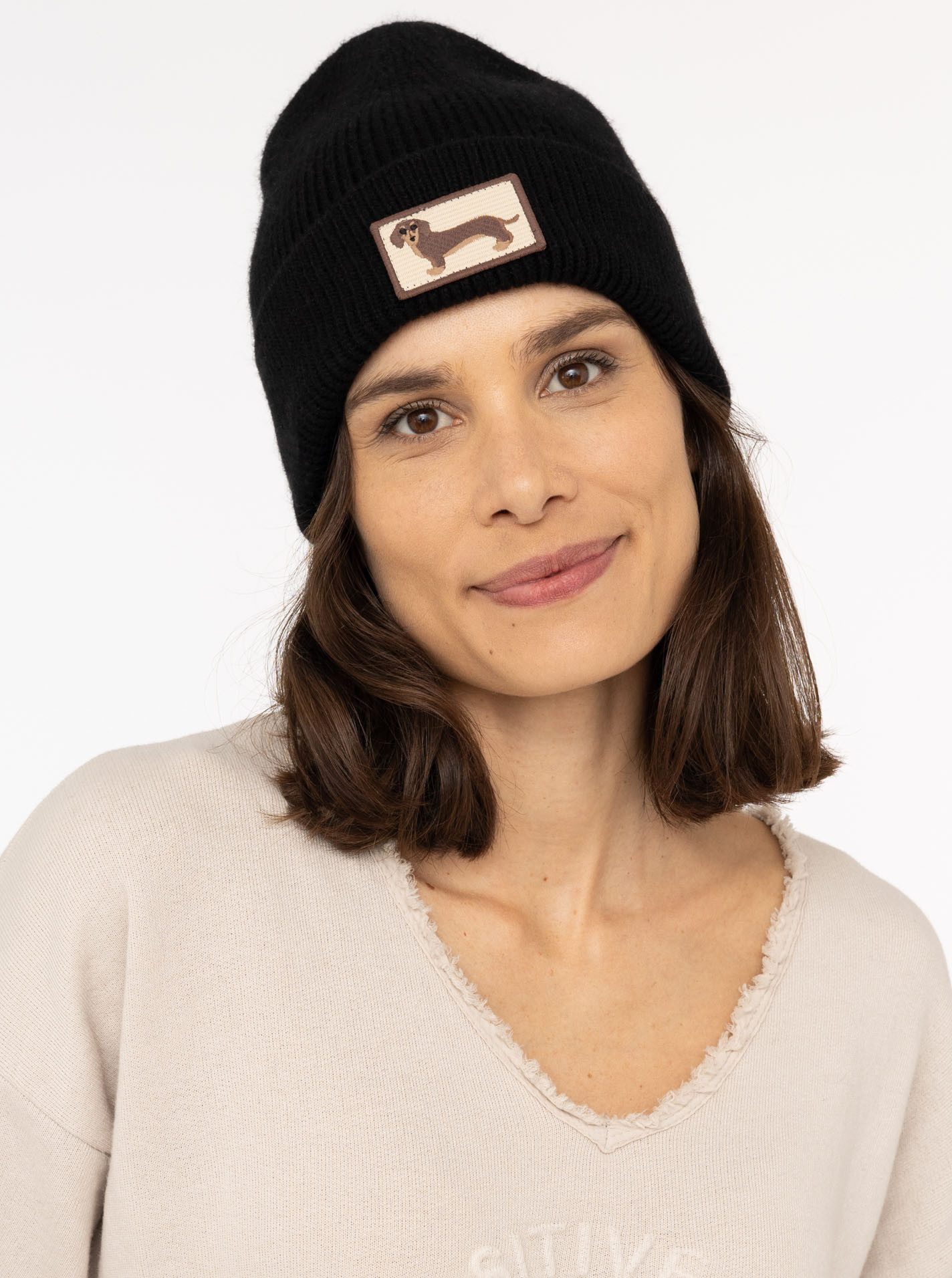 Zwillingsherz Beanie "Dog Patch" mit süßem Dackelmotiv und Wollanteil