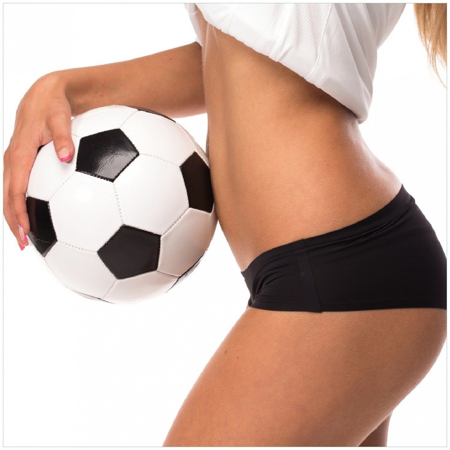 Wallario Memoboard Fußball - sexy Frau mit einem Fußball