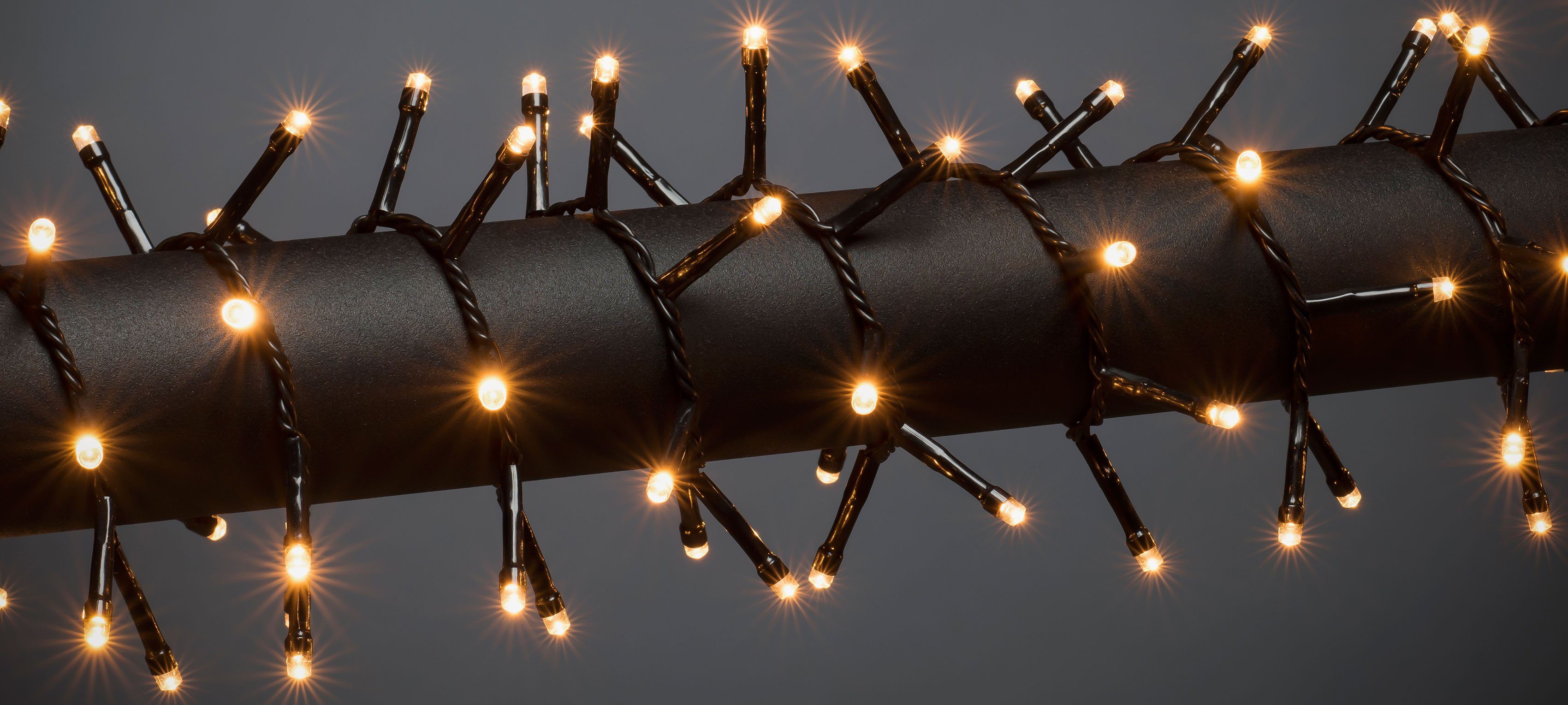 KONSTSMIDE LED-Lichterkette Weihnachtsdeko, Micro Cluster, bernsteinfarbene Dioden Büschellichterkette 600 LED