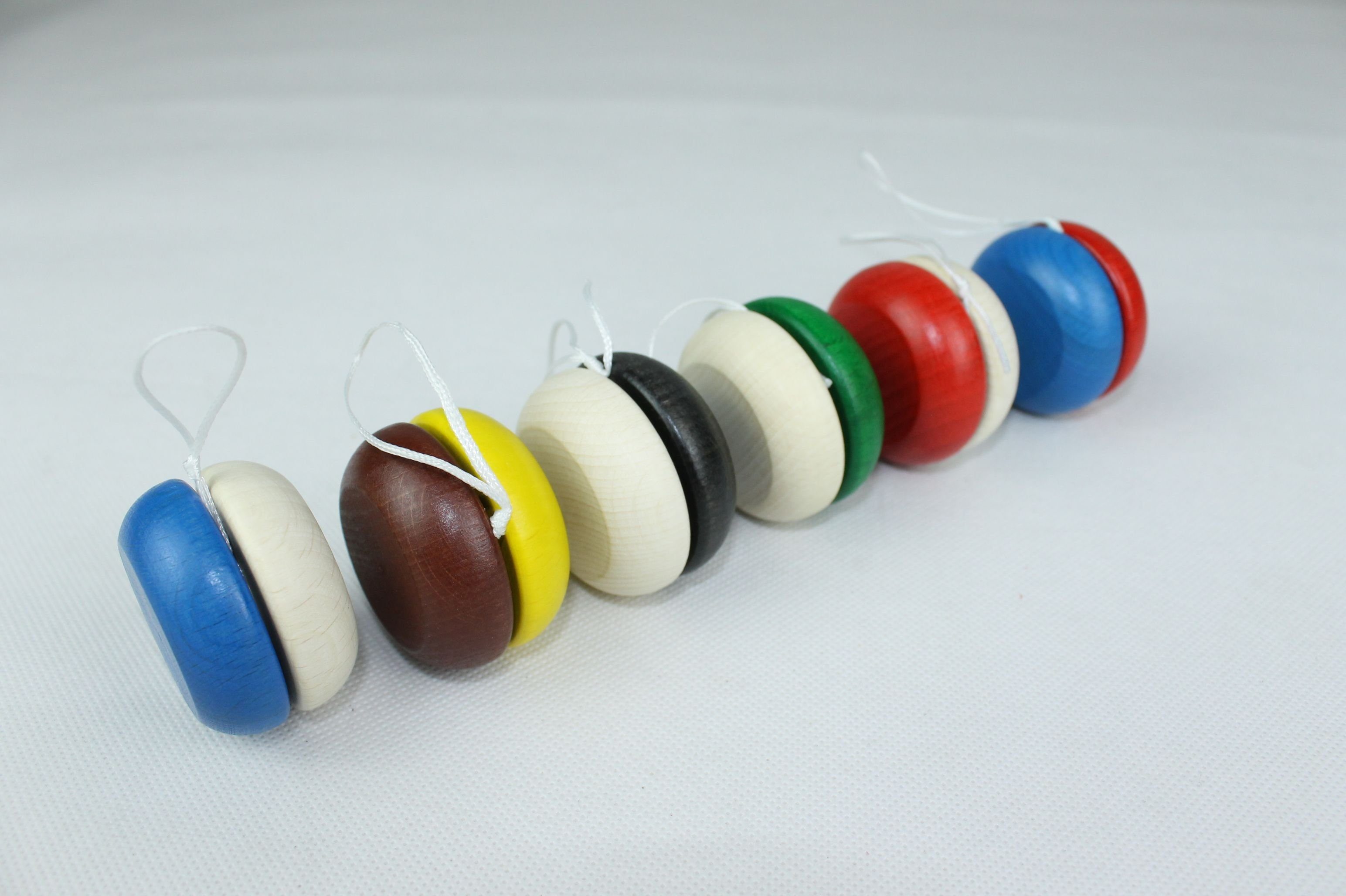 Erzgebirgische Holzspielwaren Ebert GmbH Brummkreisel Holzspielzeug Yo-Yo Blau-Gelb BxT 5x3cm NEU, fördert Geschicklichkeit