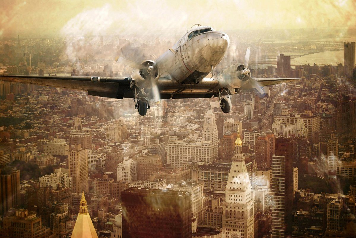 Papermoon Fototapete Flugzeug über Stadt