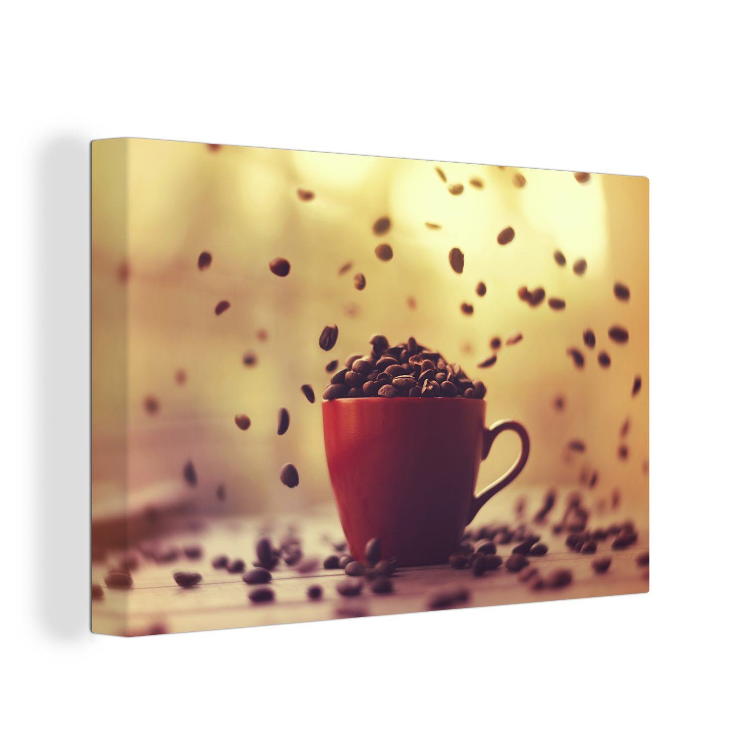 OneMillionCanvasses® Leinwandbild Fallende Kaffeebohnen in einer Kaffeetasse, (1 St), Wandbild Leinwandbilder, Aufhängefertig, Wanddeko, 30x20 cm