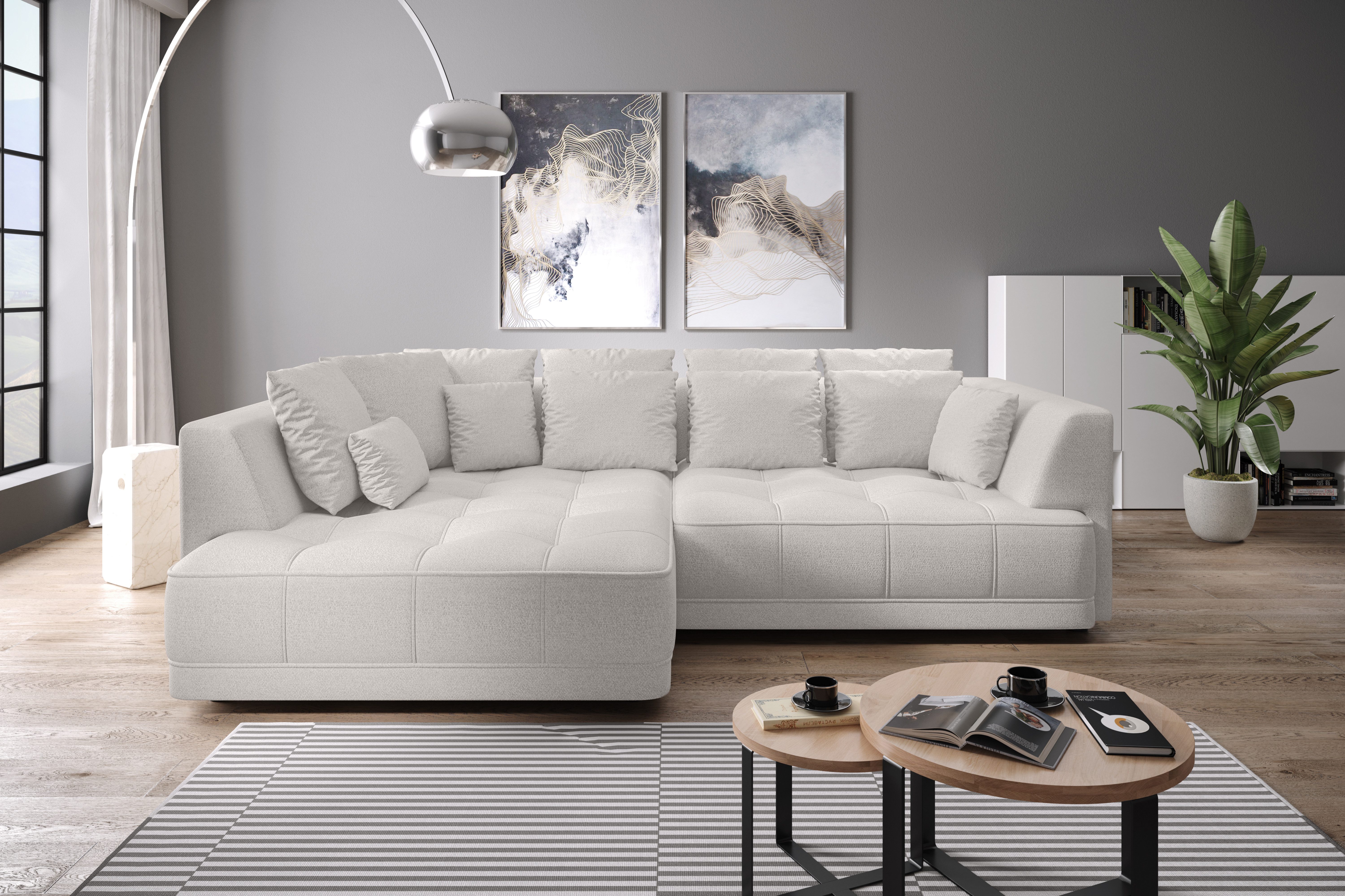 WERK2 Ecksofa Tiga, Komfortsofa mit elekt. Auszugsfunktion, bequem, L-Form, Pure Wohlfühlgarantie: Ausziehbare Sitztiefe, XXL-Ottomane & Kissen.