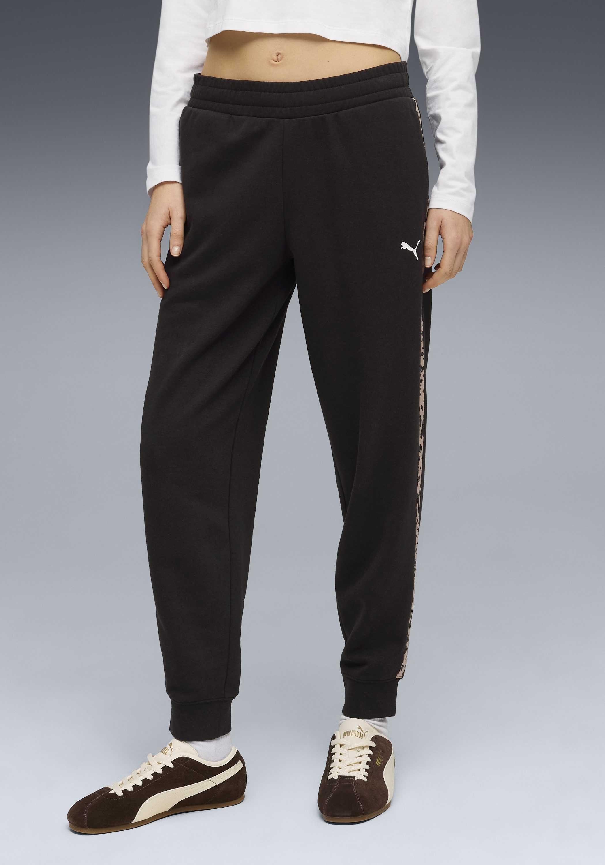 PUMA Trainingshose ESS GRAPHIC ANIMAL COMFORT PANTS TR CL für Sport- und Freizeitaktivitäten, mit Eingrifftaschen