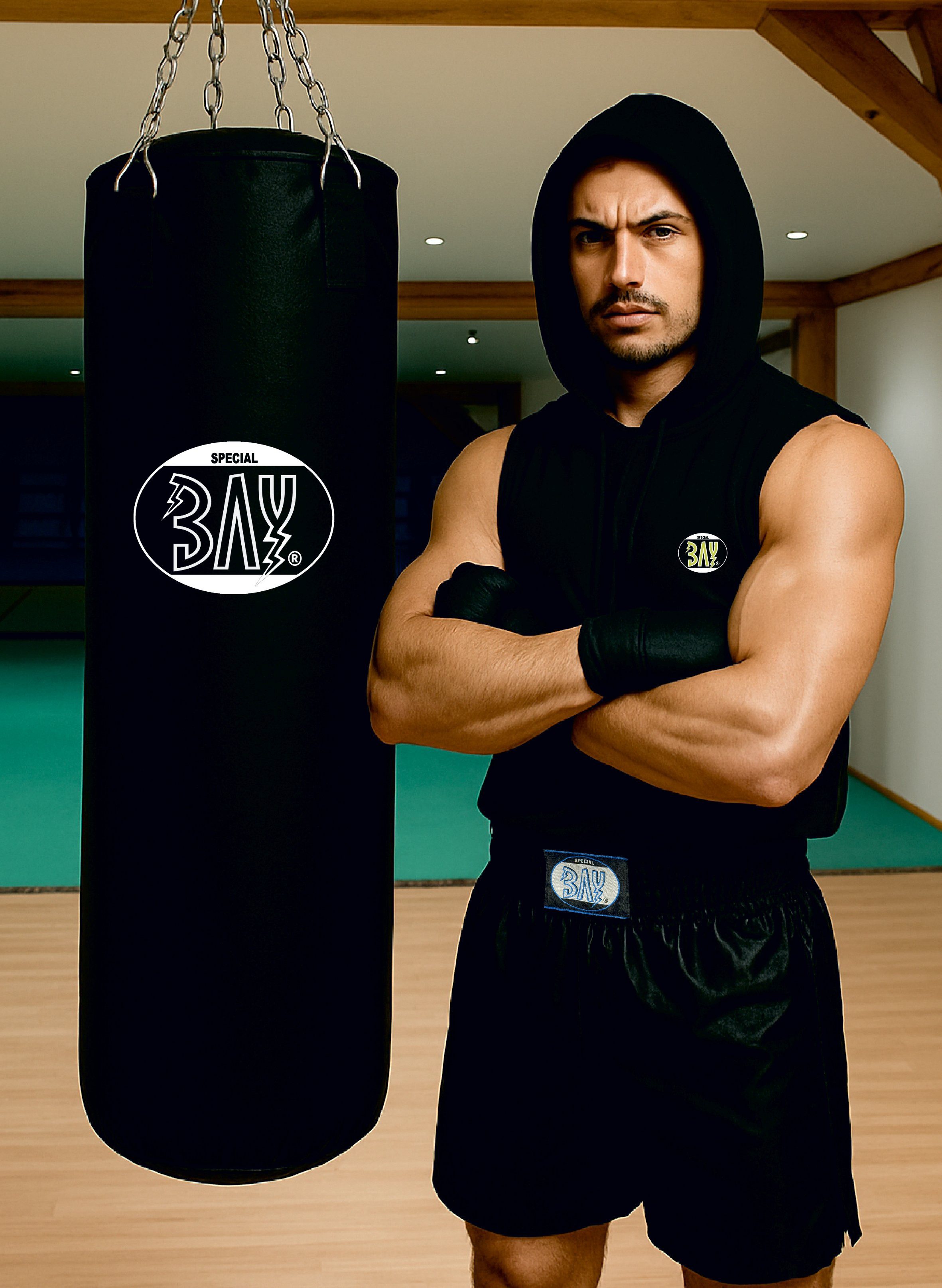 BAY-Sports Boxsack Sandsack 120 cm Erwachsene schwarz ungefüllt groß Boxen Kickboxen MMA (Stück), inkl. Verchromter 4-strahlige Stahlkettenaufhängung mit Drehwirbel.