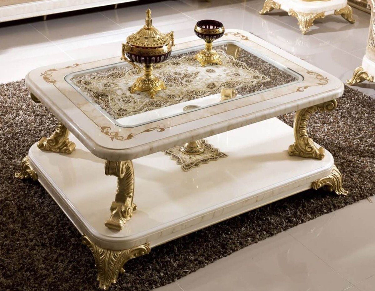 Casa Padrino Couchtisch Luxus Barock Couchtisch mit Glasplatte Weiß / Beige / Gold - Prunkvoller Massivholz Wohnzimmertisch im Barockstil - Barock Möbel - Edel & Prunkvoll