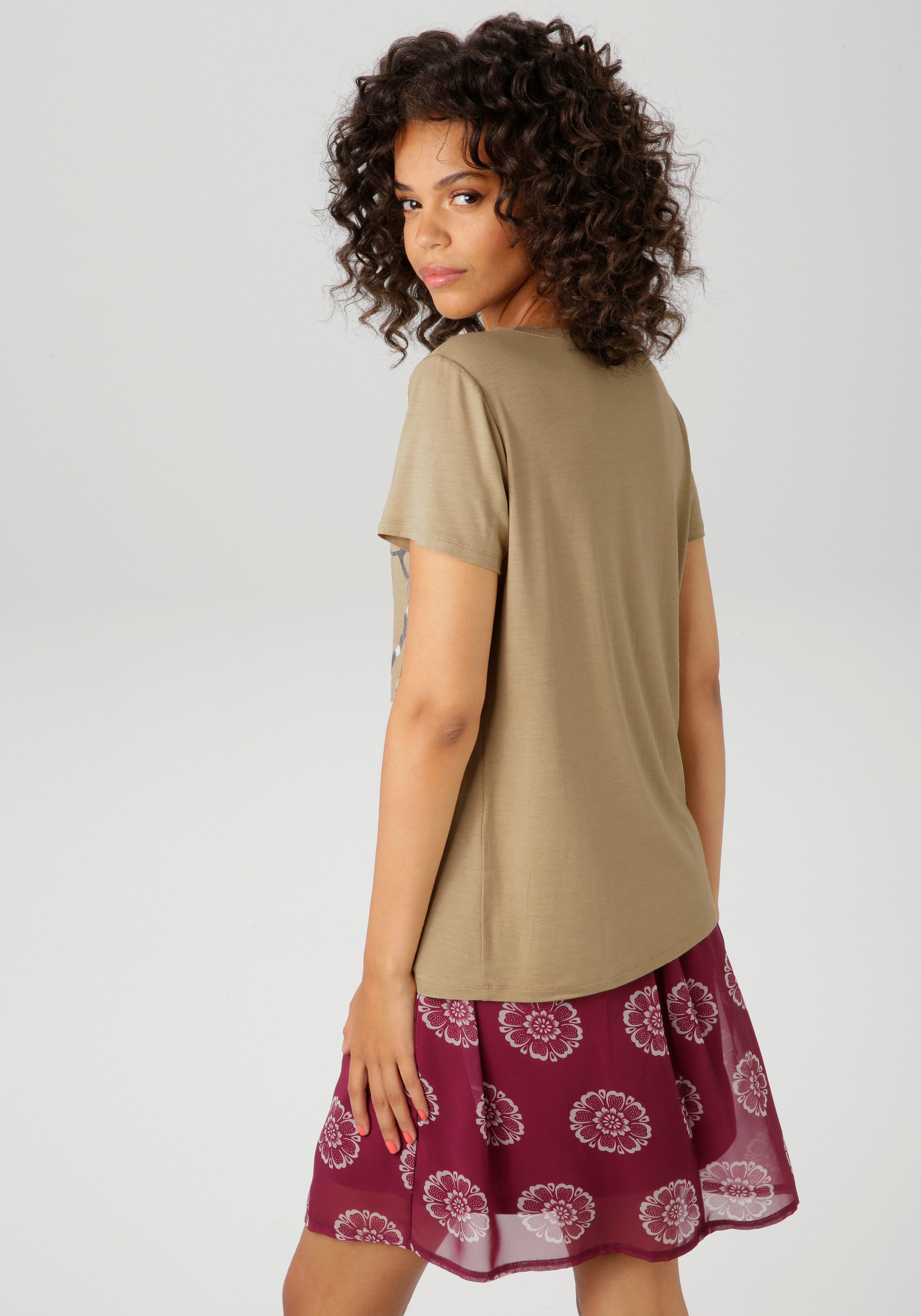 Aniston CASUAL T-Shirt mit abstraktem Gesicht günstig online kaufen