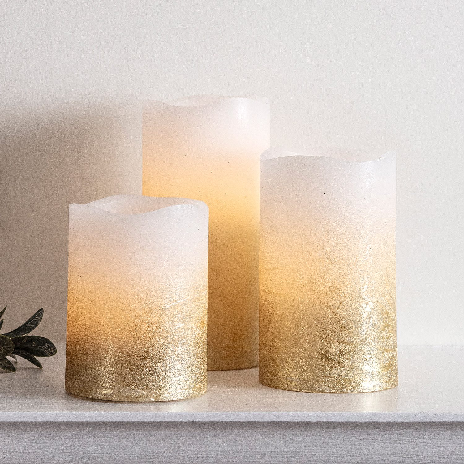 Lights4fun LED-Kerze 3er Set LED Echtwachs Kerzen warmweiß flackernd gold