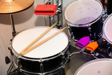 XDrum Percussion-Set Percussion Block Dual - Zwei unterschiedlich gestimmte Agogo-Blocks an einer Halterung - Aus unverwüstlichem Kunststoff - Kräftiger, durchsetzungsfähiger Ton - Violett/Orange, Agogo Bells aus Kunststoff!