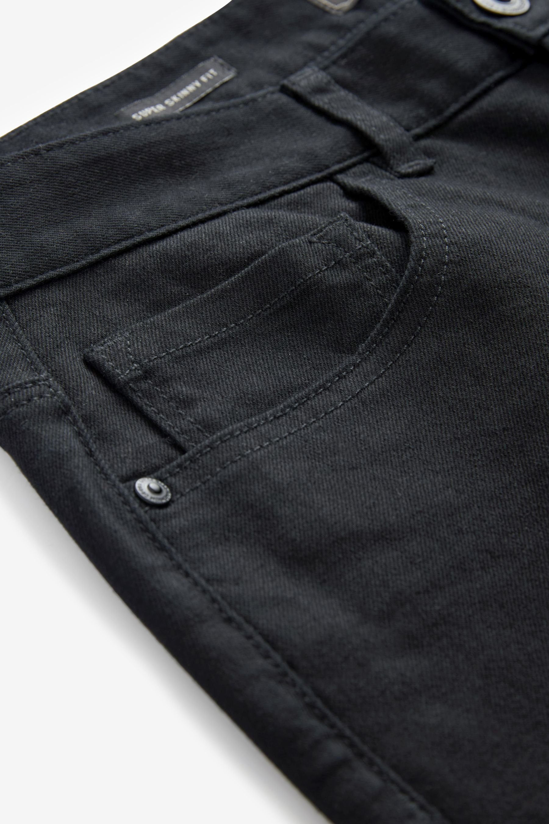Skinny-fit-Jeans Solid Next im Black Skinny (1-tlg) Fit Super Stretchjeans