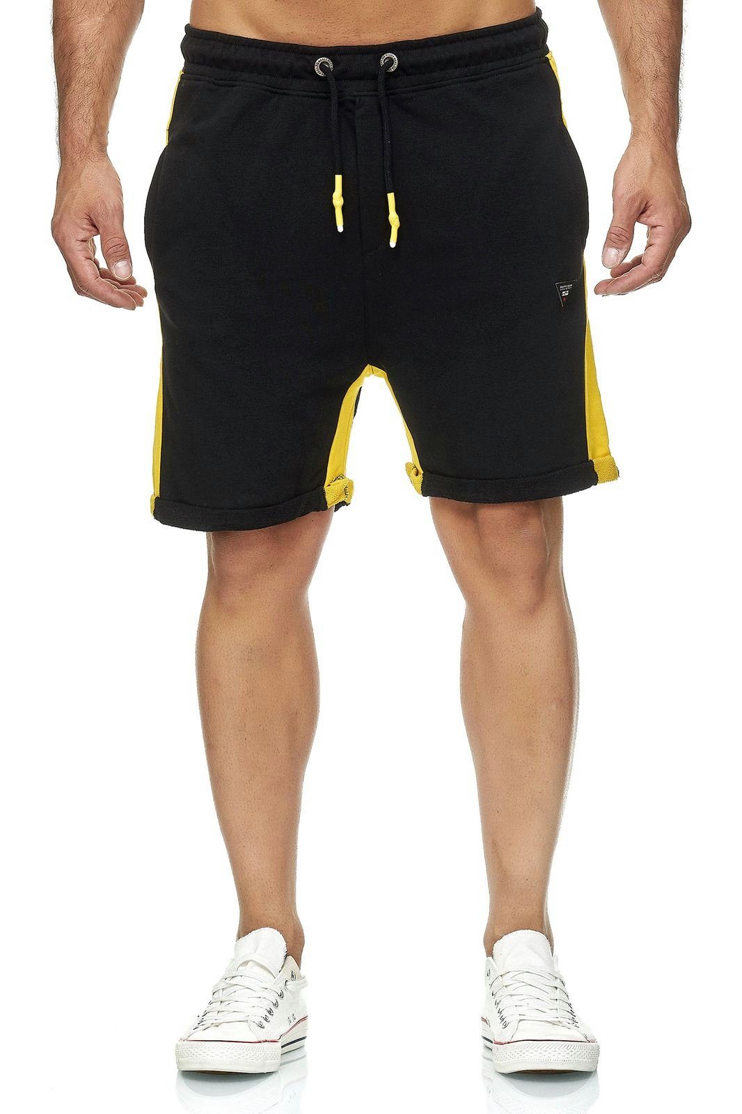 Rusty Neal Shorts mit bequemem Tragekomfort schwarz, gelb