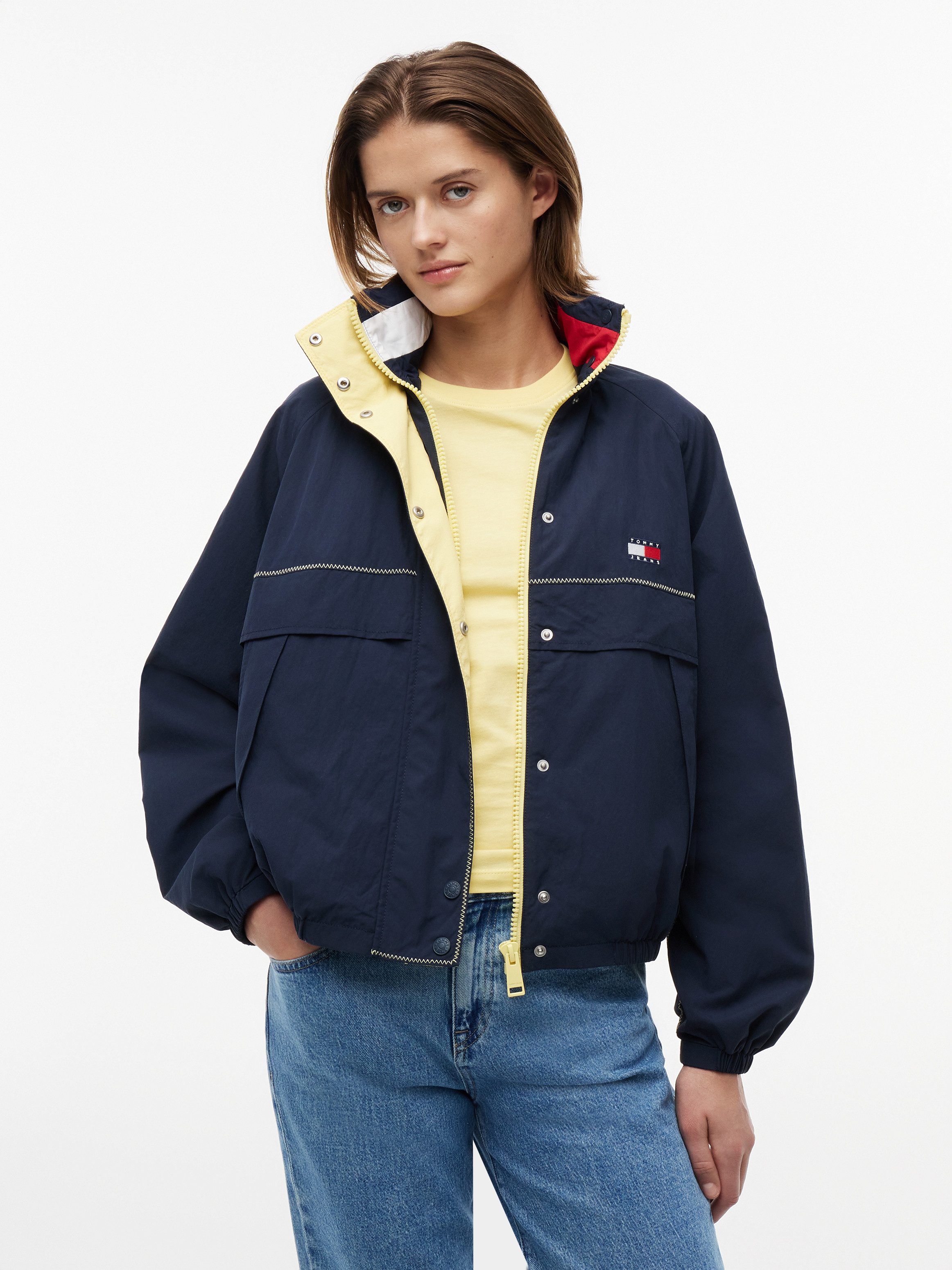 Tommy Jeans Windbreaker TJW COLORBLOCK WINDBREAKER Kunstfaser, elastische Bündchen, verdeckter Reißverschluss