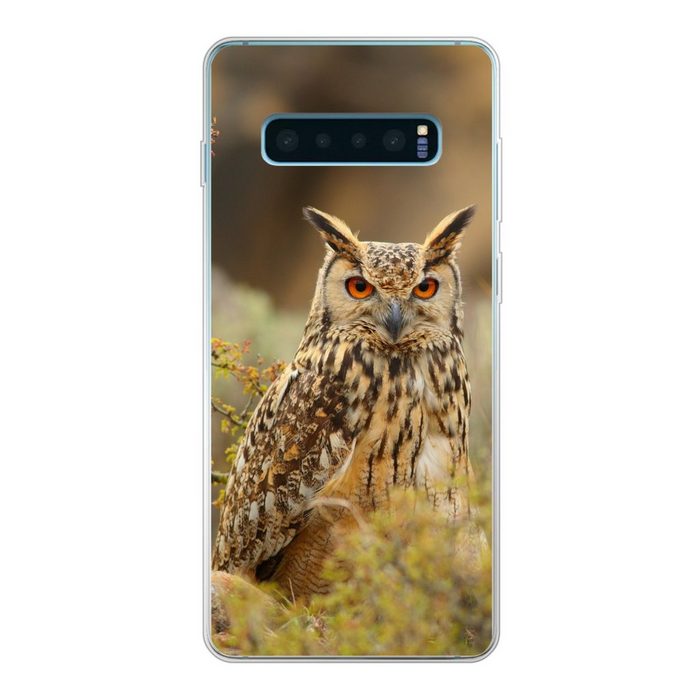 MuchoWow Handyhülle Ein Uhu in der Natur bei Sonnenuntergang Phone Case Handyhülle Samsung Galaxy S10+ Silikon Schutzhülle