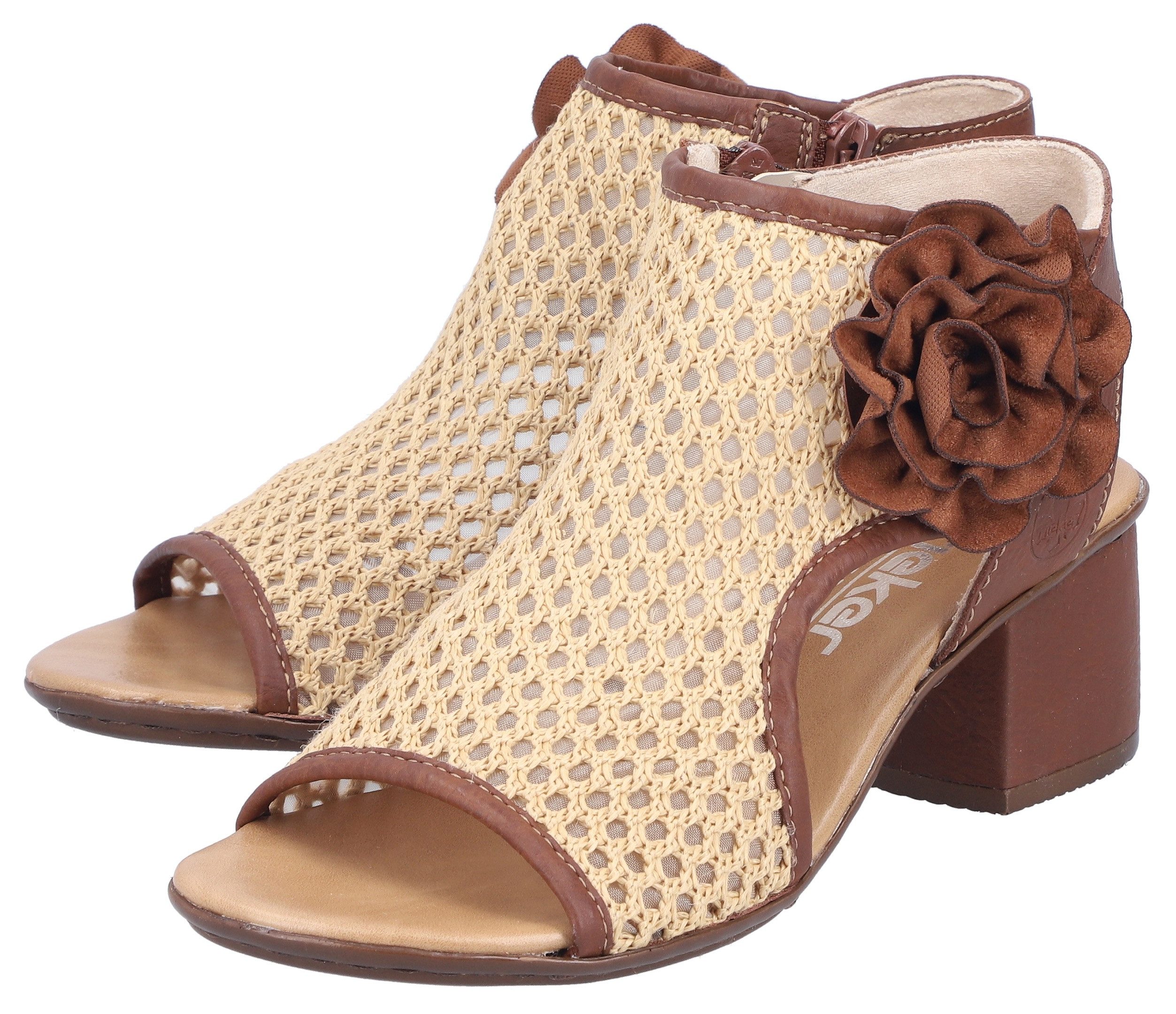 Rieker Schaftsandalette Sommerschuh, Urlaubsschuh mit dekorativer Blüten-Verzierung