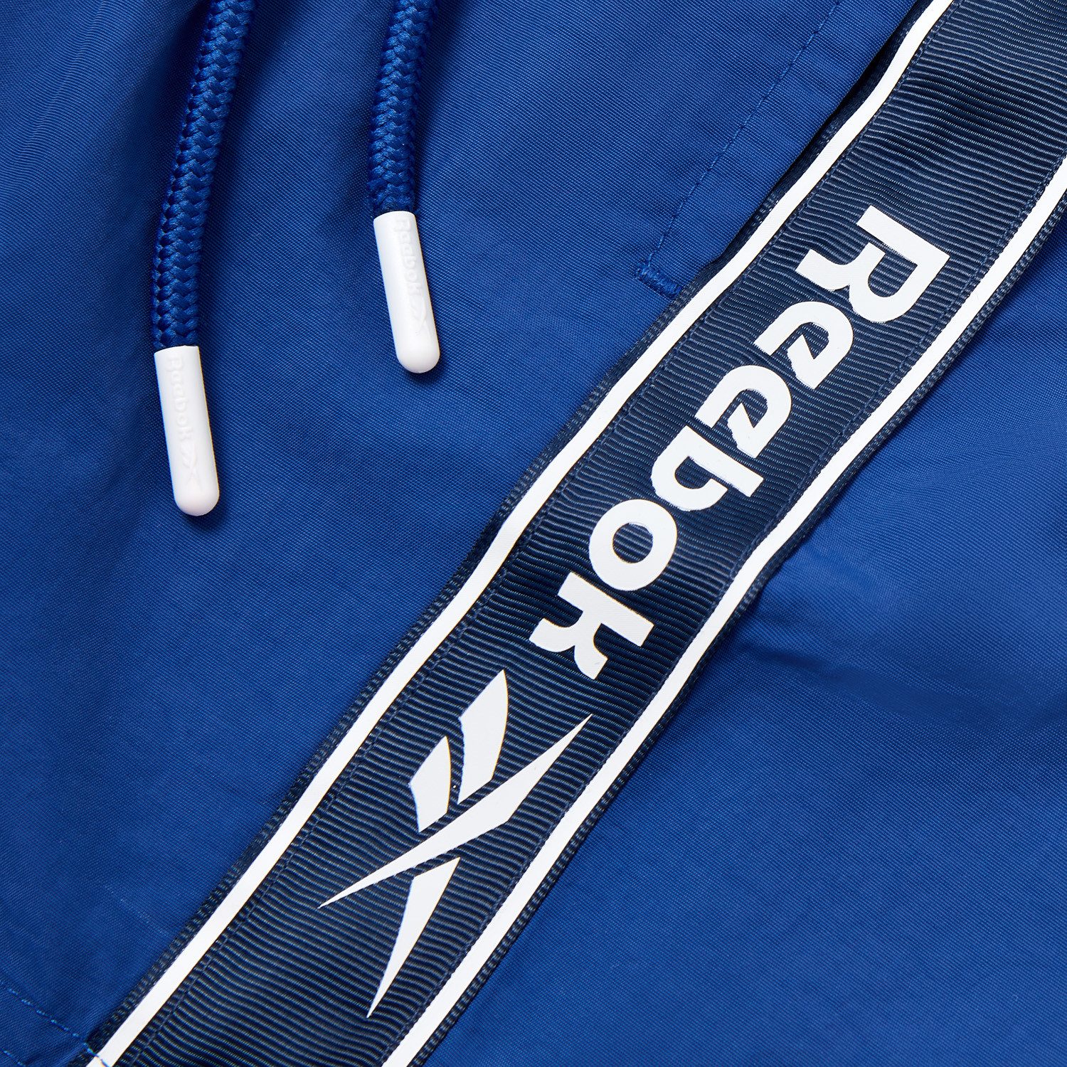 Reebok Badeshorts Tanner mit seitlichen Taschen und Logoschriftzug – Bild 5 von 5