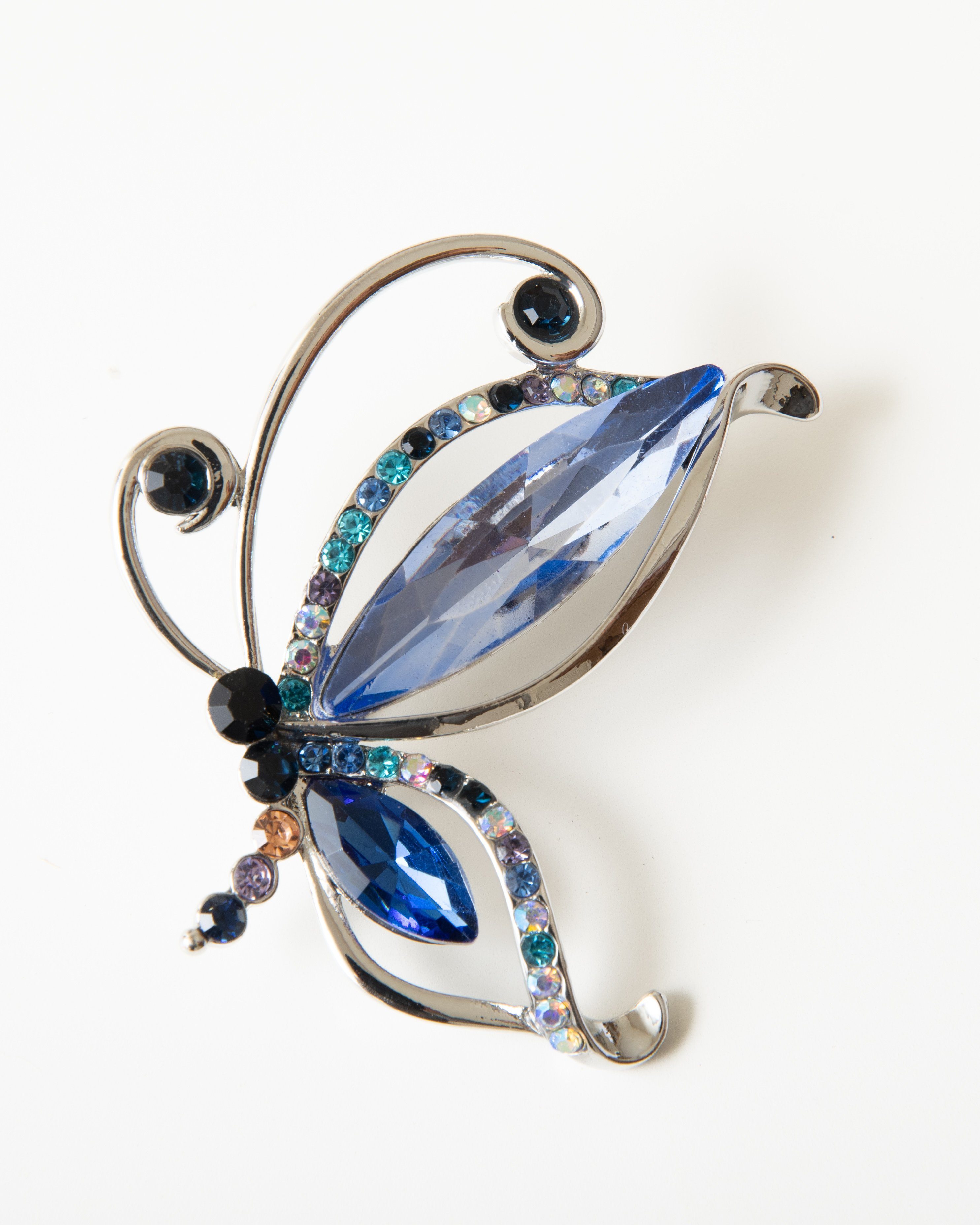 MayTree Brosche "Schmetterling", mit Strass-Steinen blau (Stück, 1-tlg), Metallbrosche in Form eines Schmetterlings aus blauen Glassteinen