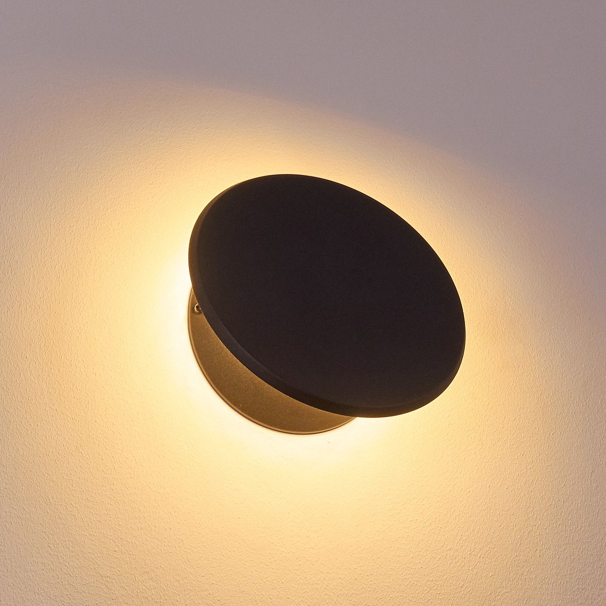 hofstein Wandleuchte Wandlampe Metall mit 3000 Lumen, LED Schwarz, Lichteffekt, »Caidate«, runde moderne aus 700 Leuchte schönem Kelvin, in