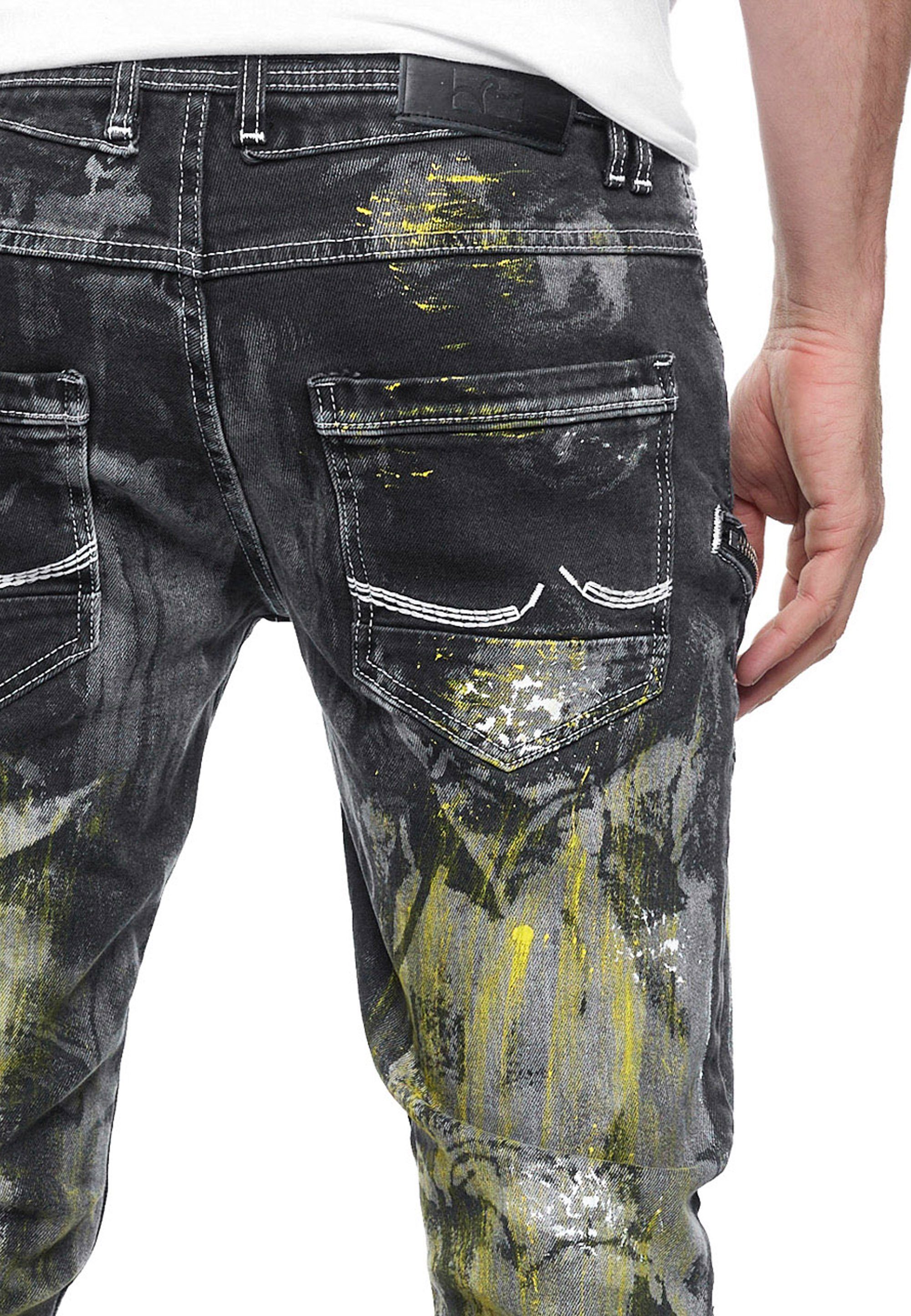Rusty Neal Straight-Jeans MORI mit trendigen Zierelementen