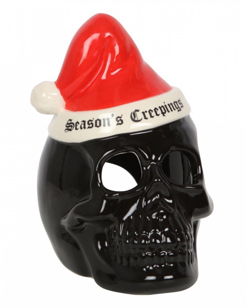 Horror-Shop Dekofigur Schwarzer Totenkopf mit Teelic Weihnachtsmannmütze