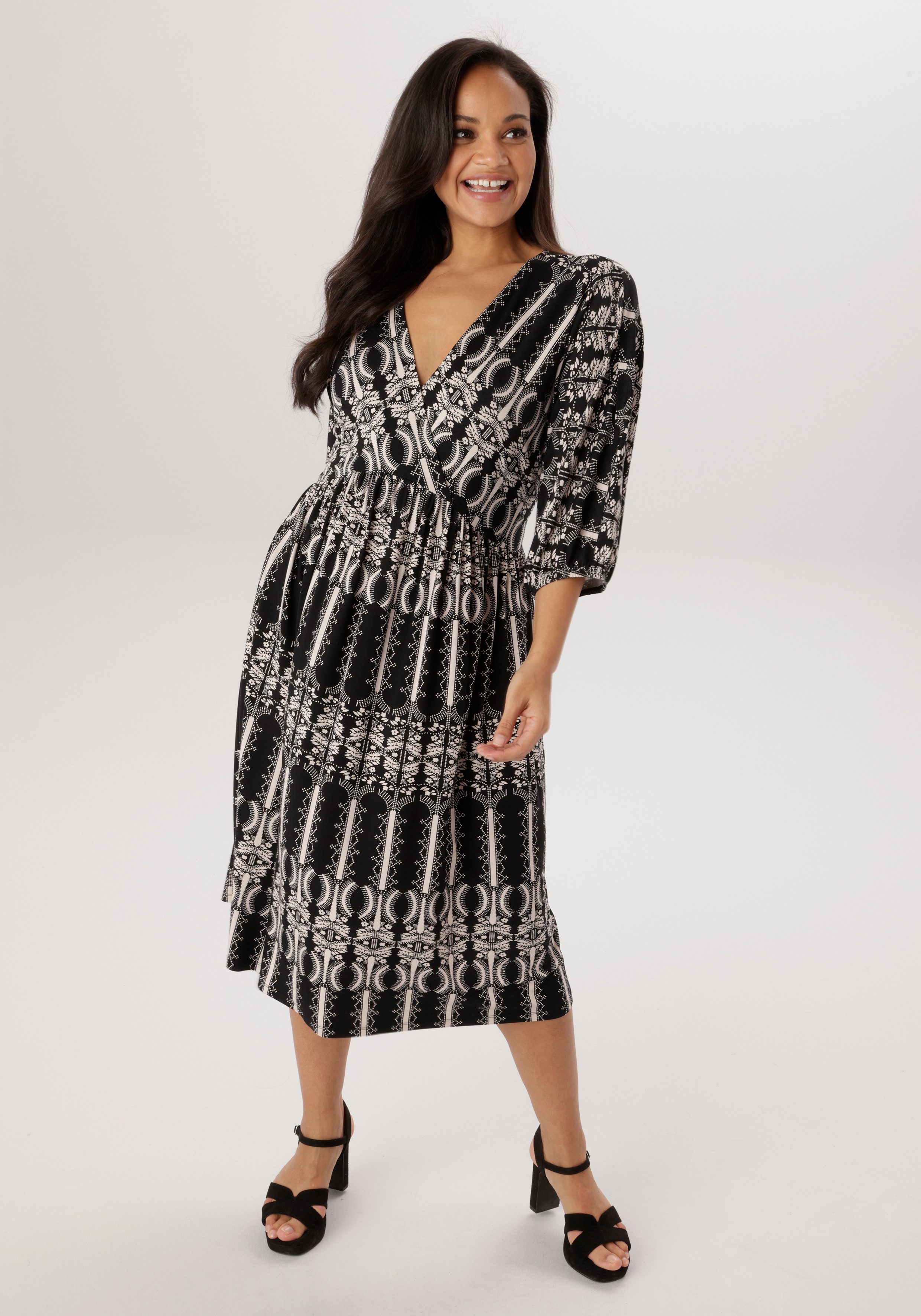 Aniston PLUS Jerseykleid in Wickeloptik - NEUE KOLLEKTION. € 59,99, (€ 59,99 pro 1 Stk).