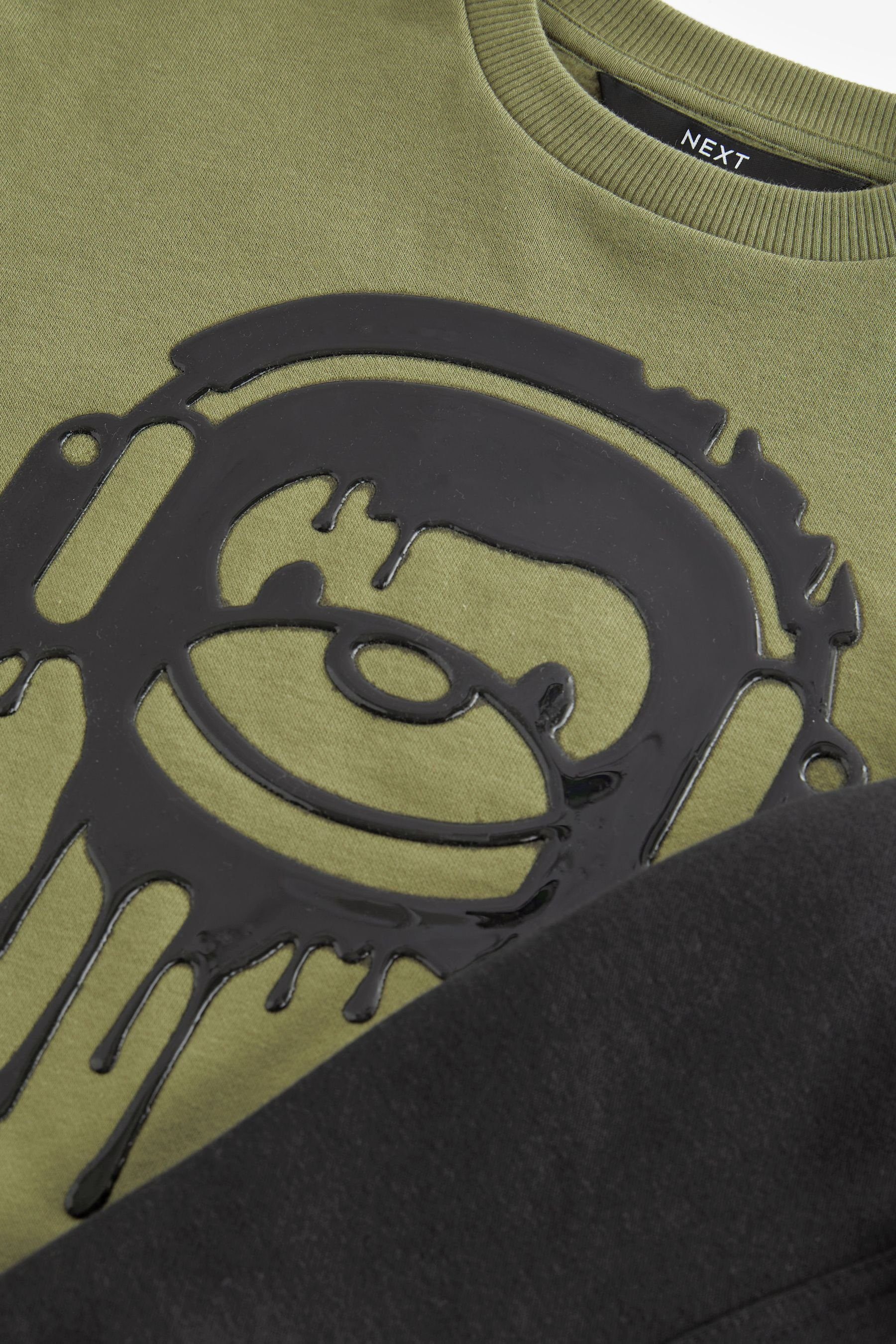 Next Sweatanzug Sweatshirt und Set (2-tlg) Drippy Motiv Bear mit im Khaki Jogginghose Green/Black