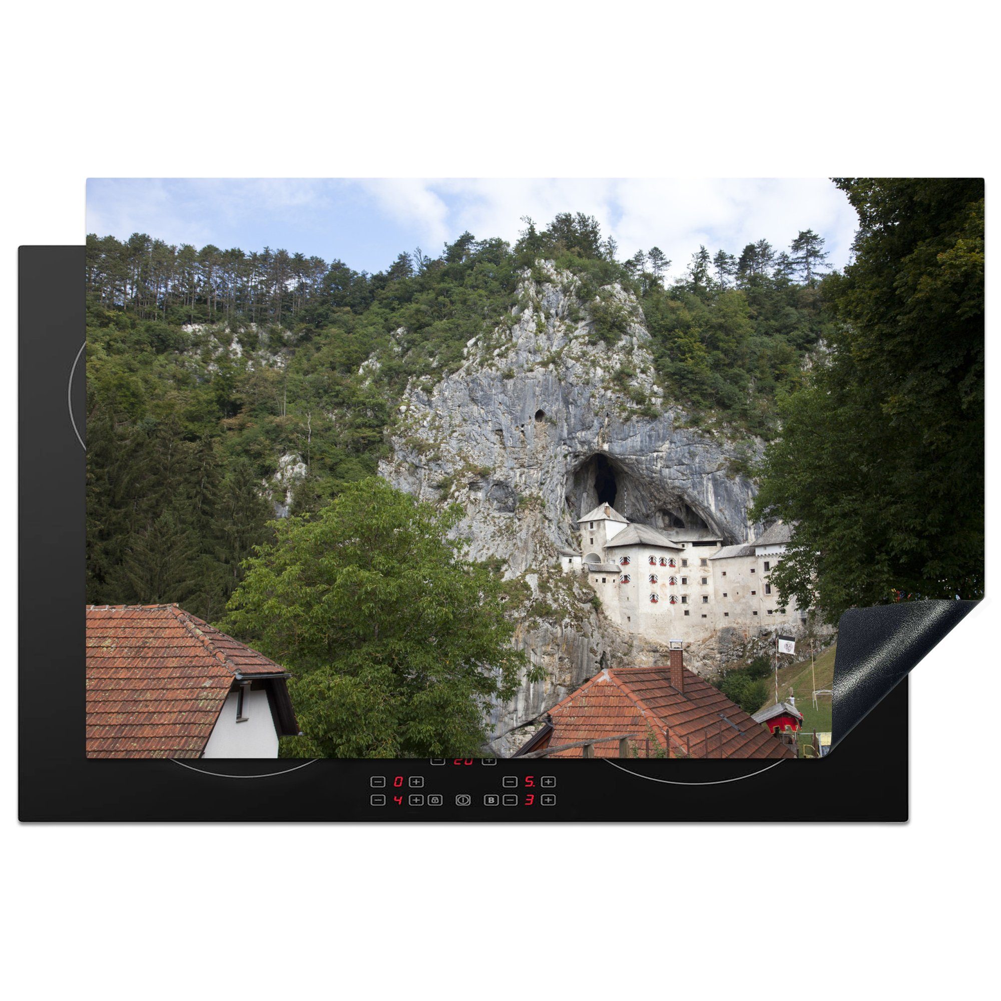 MuchoWow Herdblende-/Abdeckplatte Grad Predjama mit Blick auf die Landschaft in Slowenien, Vinyl, (1 tlg), 81x52 cm, Induktionskochfeld Schutz für die küche, Ceranfeldabdeckung