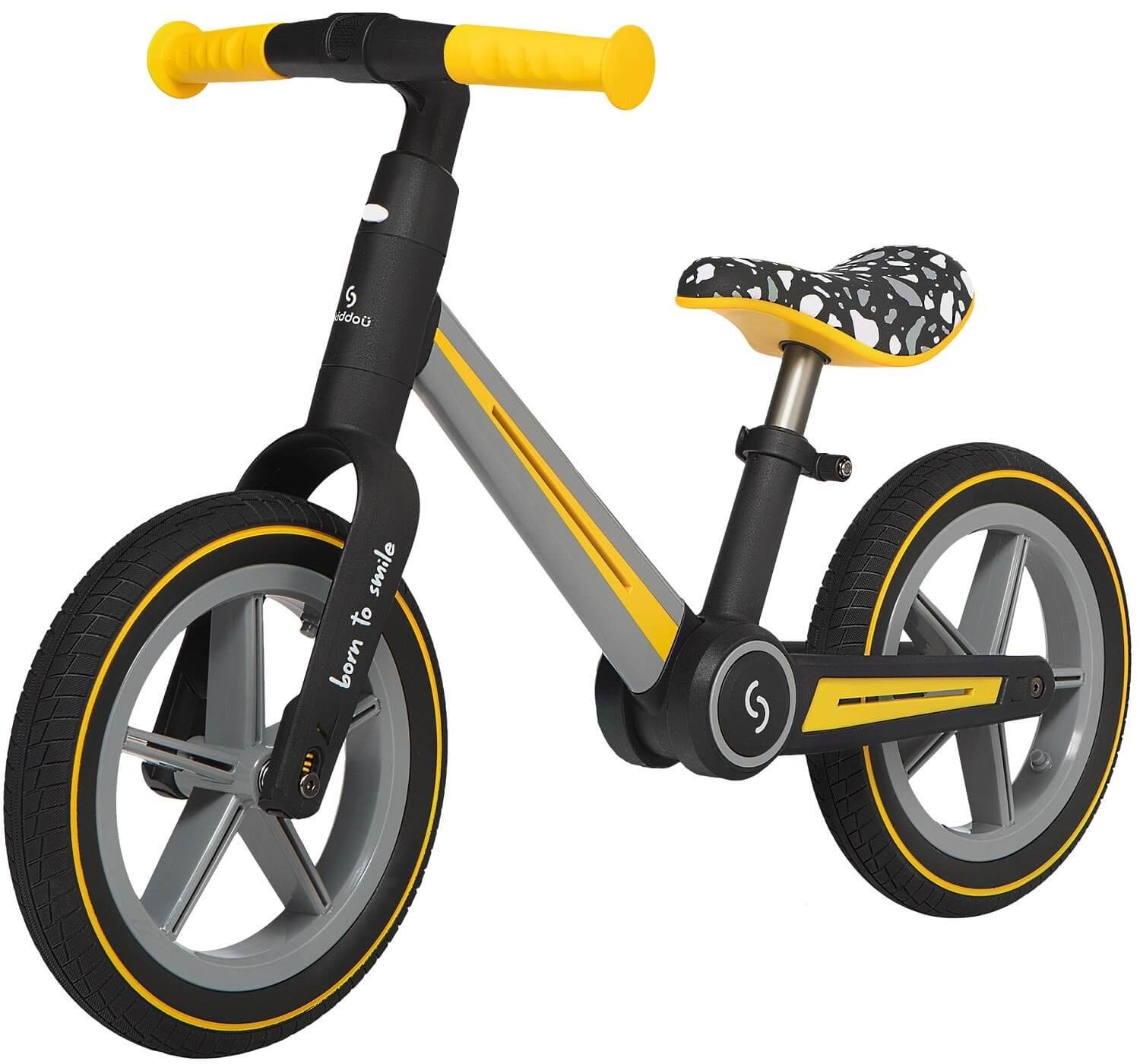 Skiddoü Laufrad Ronny faltbares Laufrad für Kinder bis 30 kg verstellbar in 3 Farben 12 Zoll, inkl. Malbuch gelb