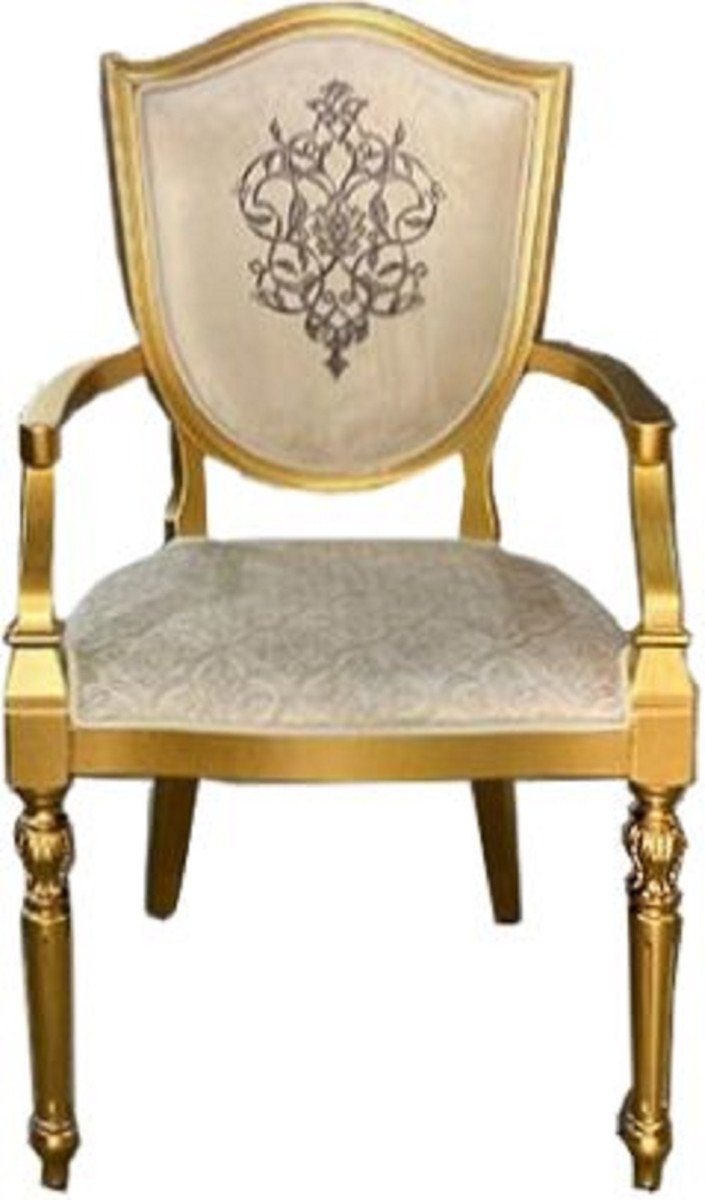 Casa Padrino Esszimmerstuhl Art Deco Esszimmerstuhl Cremefarben / Gold - Massivholz Stuhl mit Armlehnen und elegantem Muster - Art Deco Esszimmer Möbel