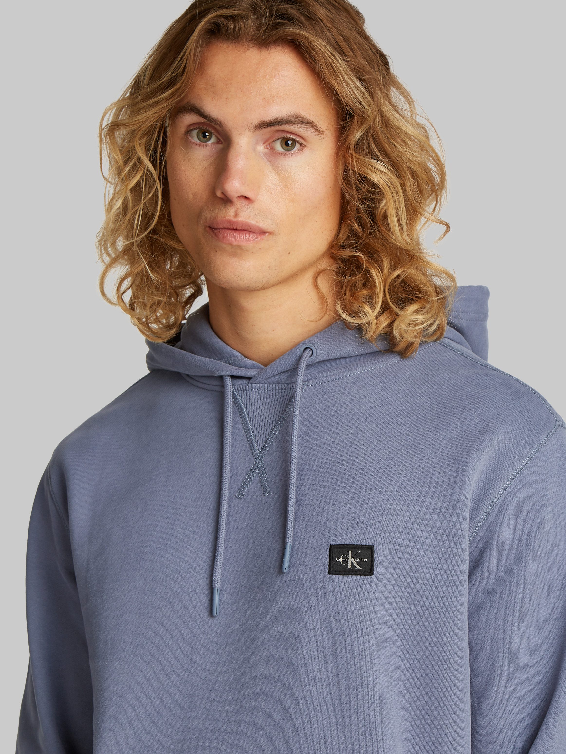 Calvin Klein Jeans Sweatshirt WOVEN LABEL HOODIE Kängurutasche, Logosticker günstig online kaufen