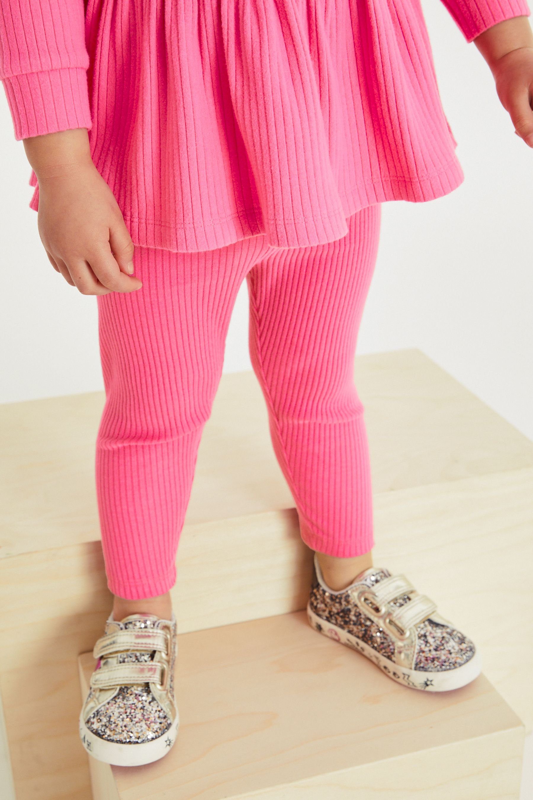 und mit Next Leggings Sweatshirt Bright Shirt Gestricktes & Leggings (2-tlg) Schößchen Pink