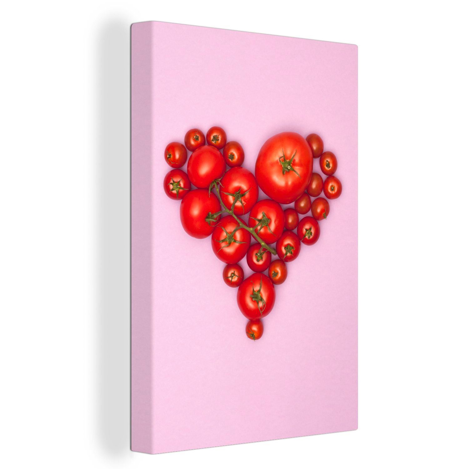 OneMillionCanvasses® Leinwandbild Tomaten in Form eines Herzens auf einem rosa Hintergrund, (1 St), Leinwandbild fertig bespannt inkl. Zackenaufhänger, Gemälde, 20x30 cm