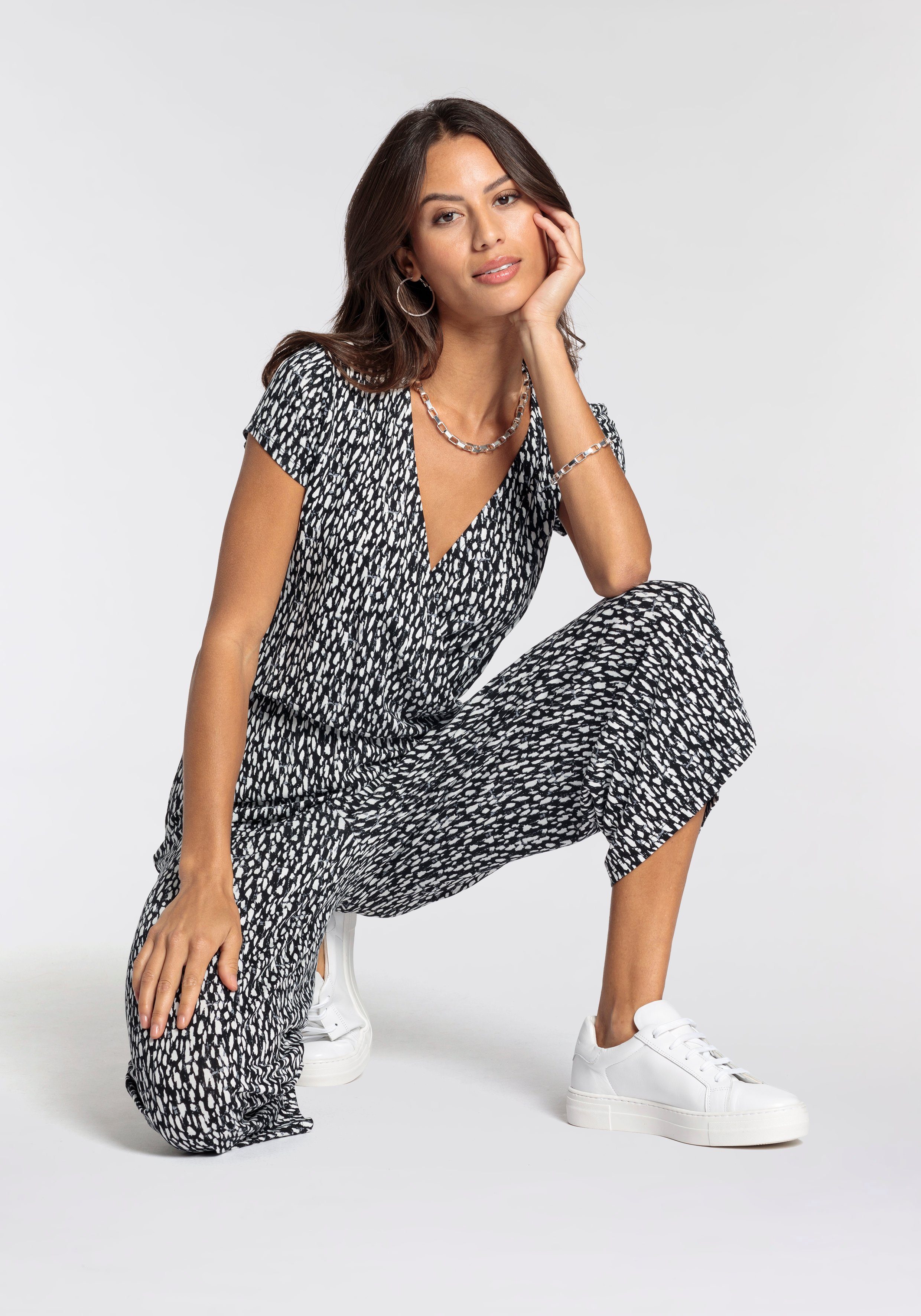 Laura Scott Jumpsuit mit V-Ausschnitt