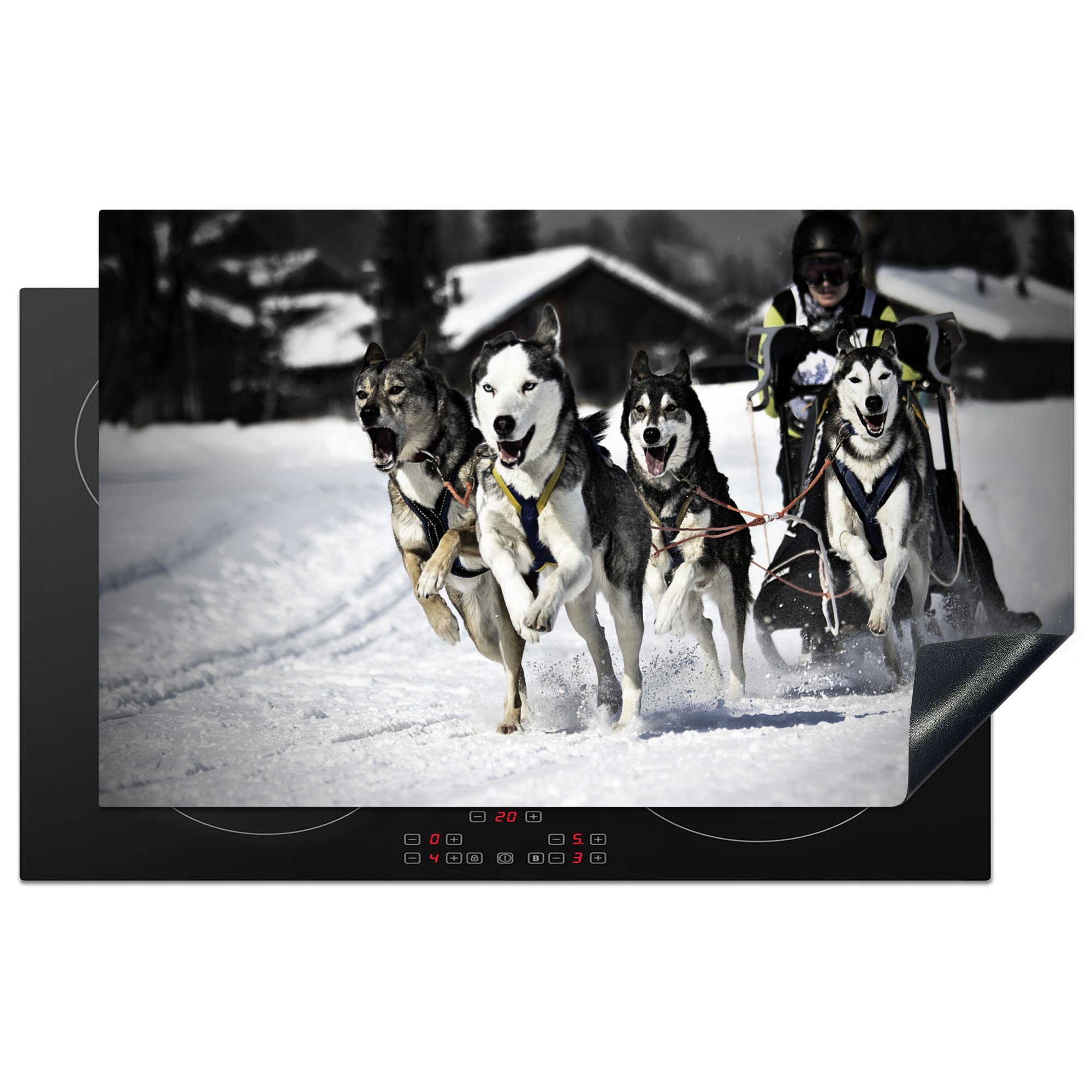 MuchoWow Herdblende-/Abdeckplatte Schlittenhunde ziehen Schlitten mit Mann durch den Schnee, Vinyl, (1 tlg), 83x51 cm, Ceranfeldabdeckung, Arbeitsplatte für küche