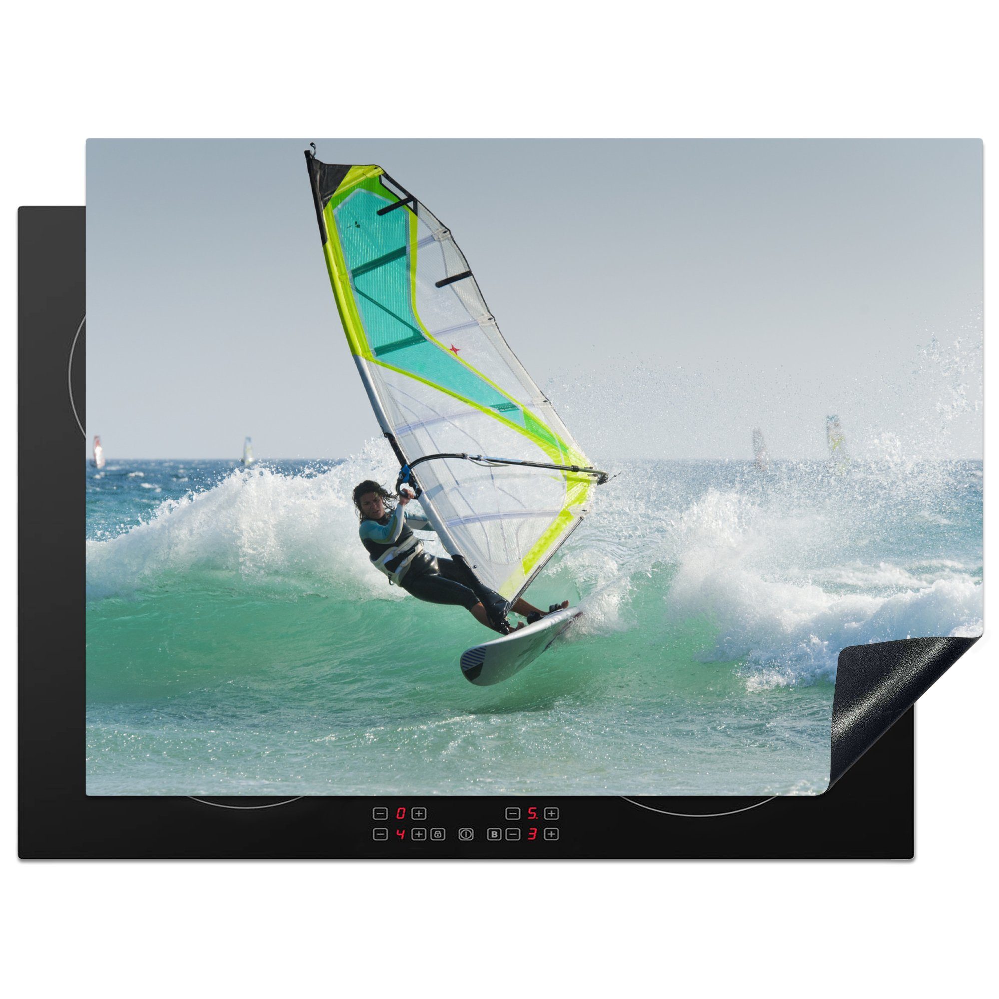 MuchoWow Herdblende-/Abdeckplatte Ein Windsurfer surft auf dem wilden Meer, Vinyl, (1 tlg), 70x52 cm, Mobile Arbeitsfläche nutzbar, Ceranfeldabdeckung